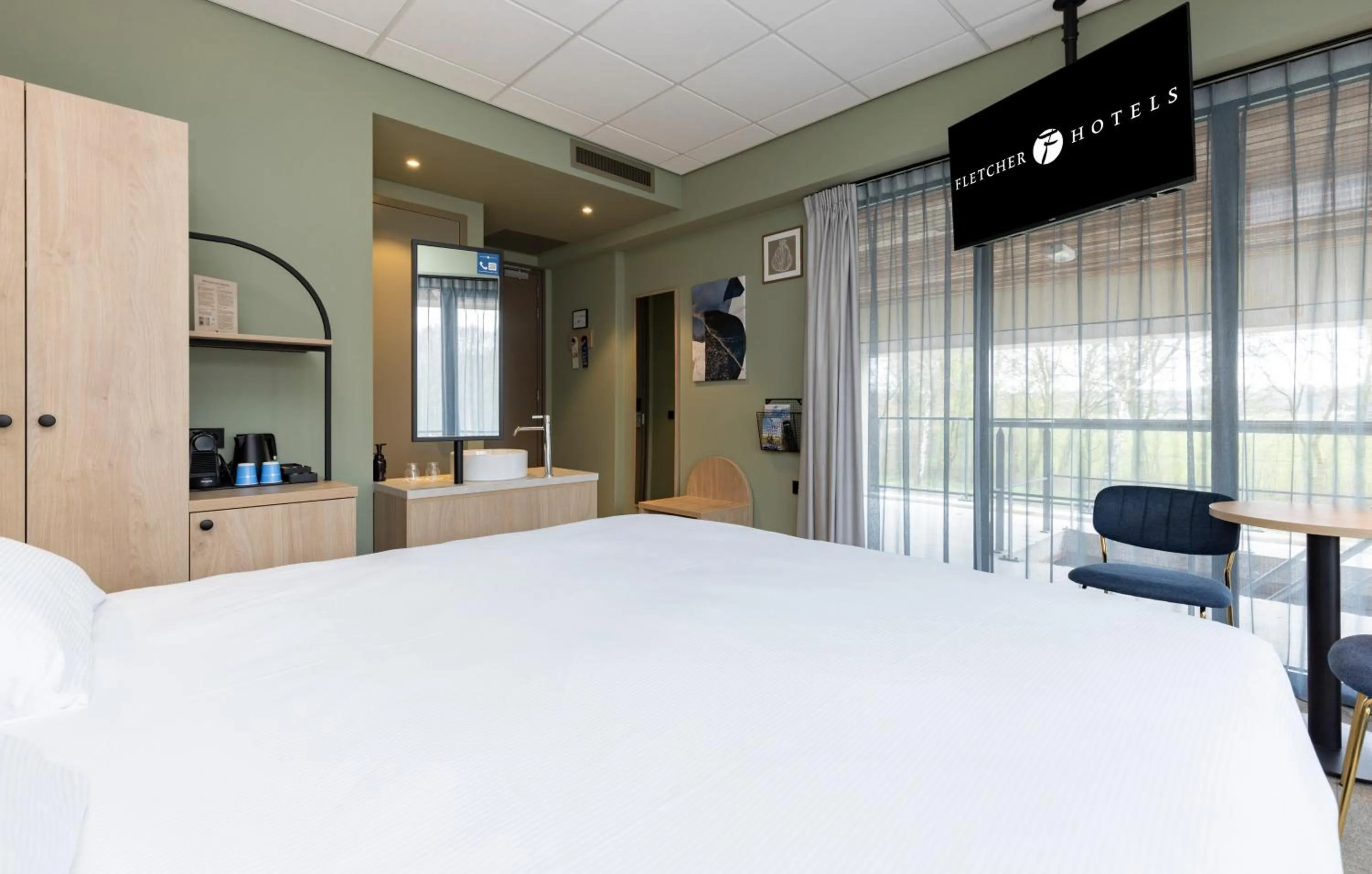 Photo of the whole room, Bed in Fletcher Hotel-Restaurant Marknesse