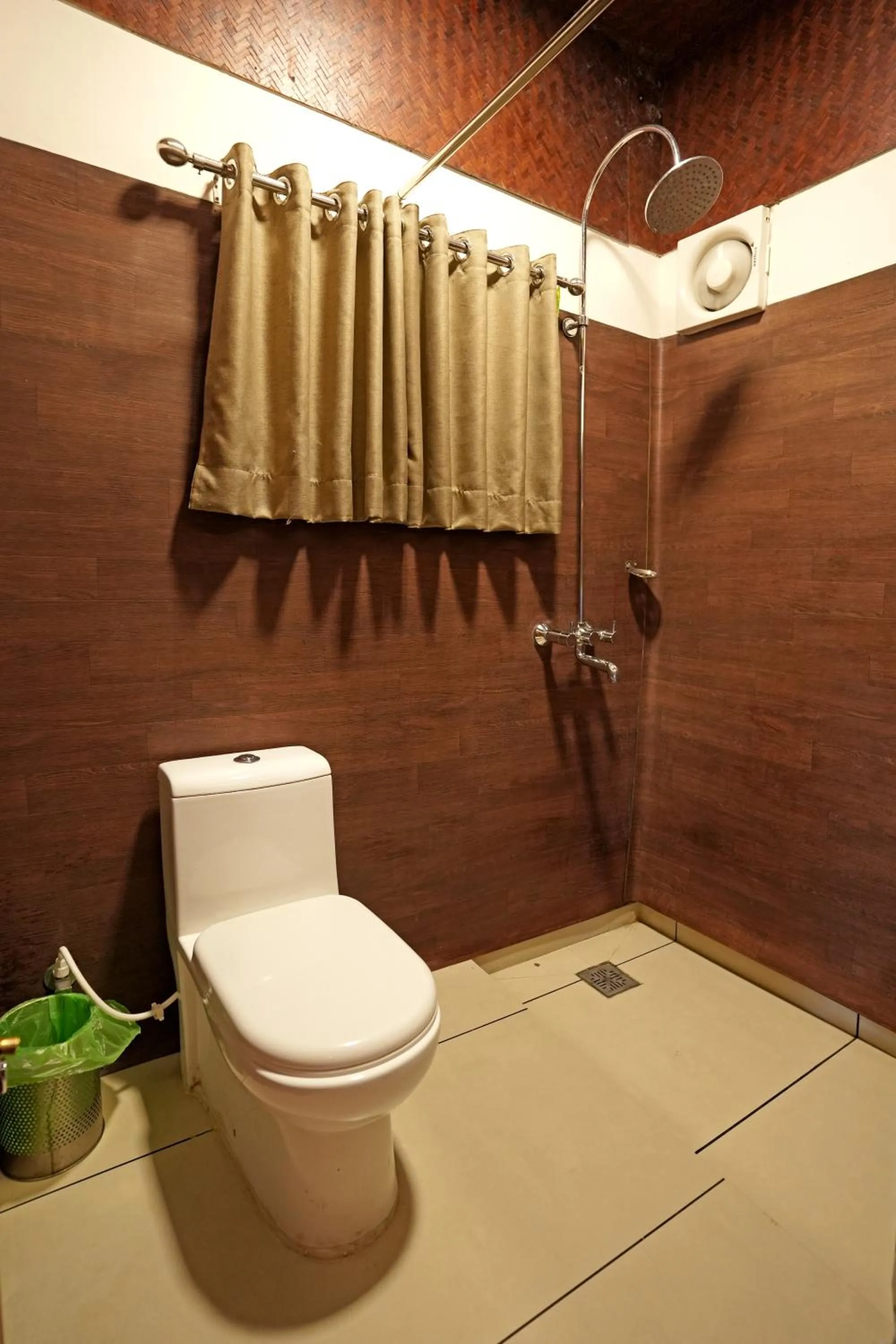 Toilet in Coffee Acres Resort