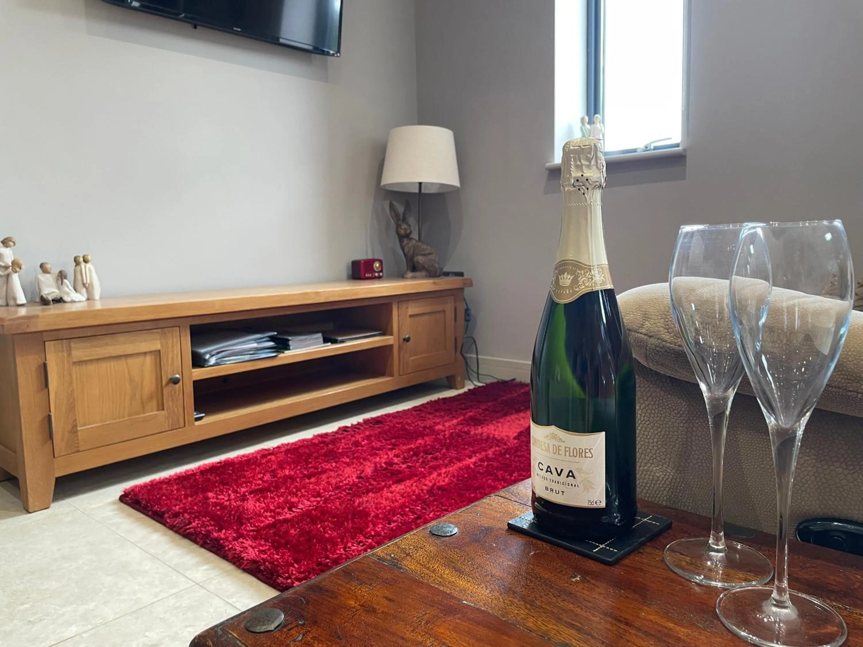 Living room in The Paddocks - Spacious annexe with rural outlook.