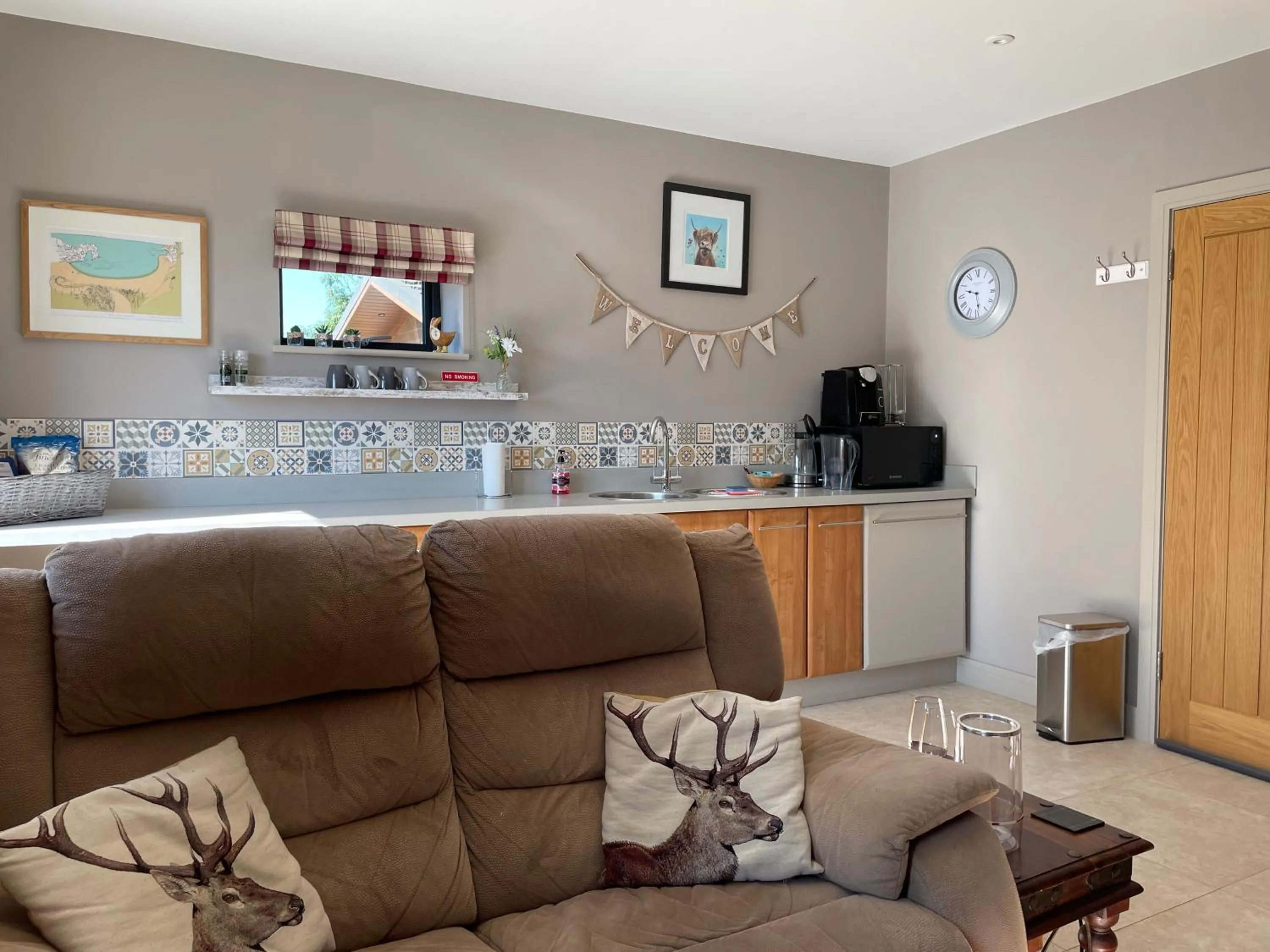 Living room in The Paddocks - Spacious annexe with rural outlook.