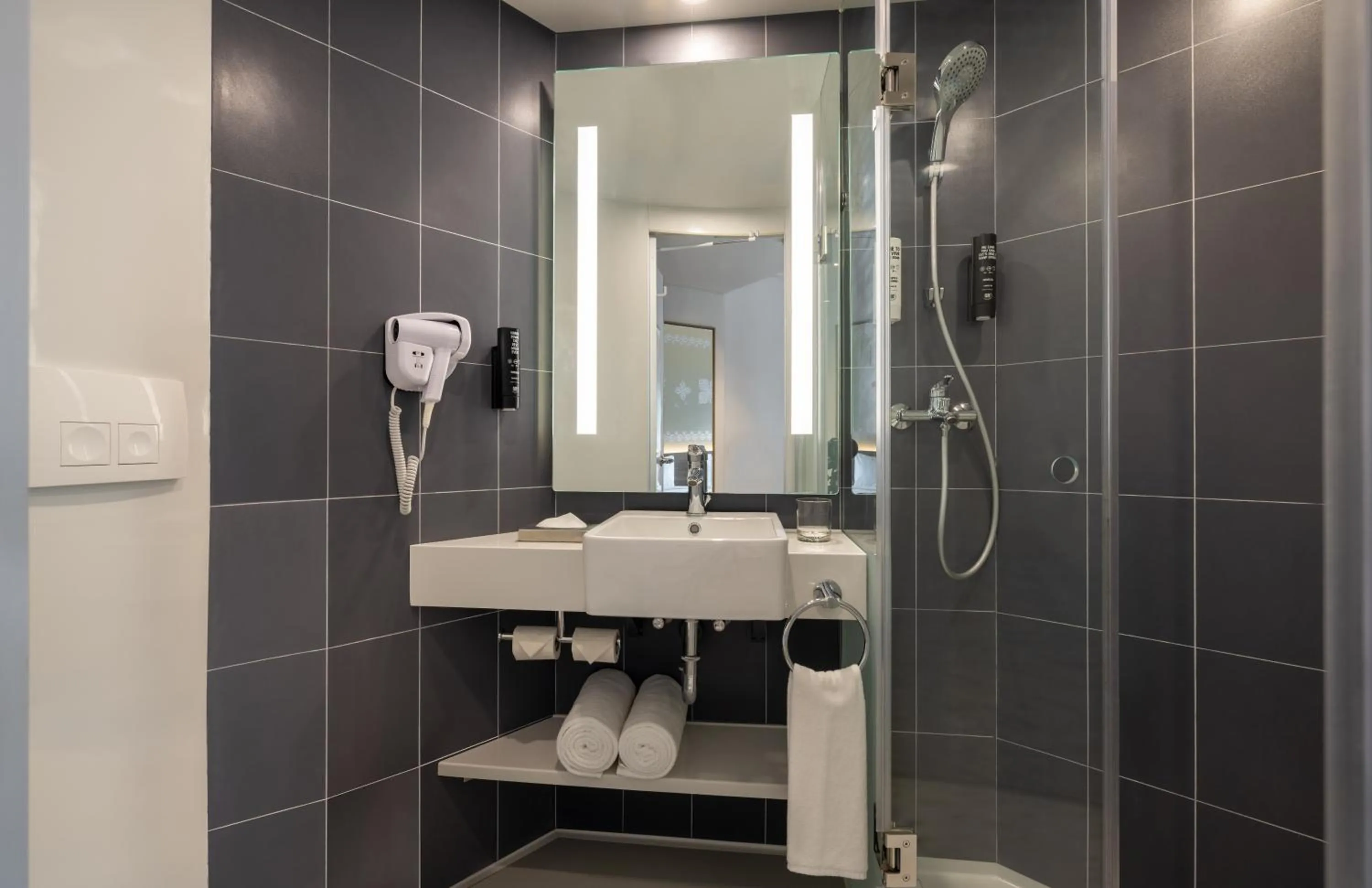 Bathroom in ibis Thane - An Accor Brand