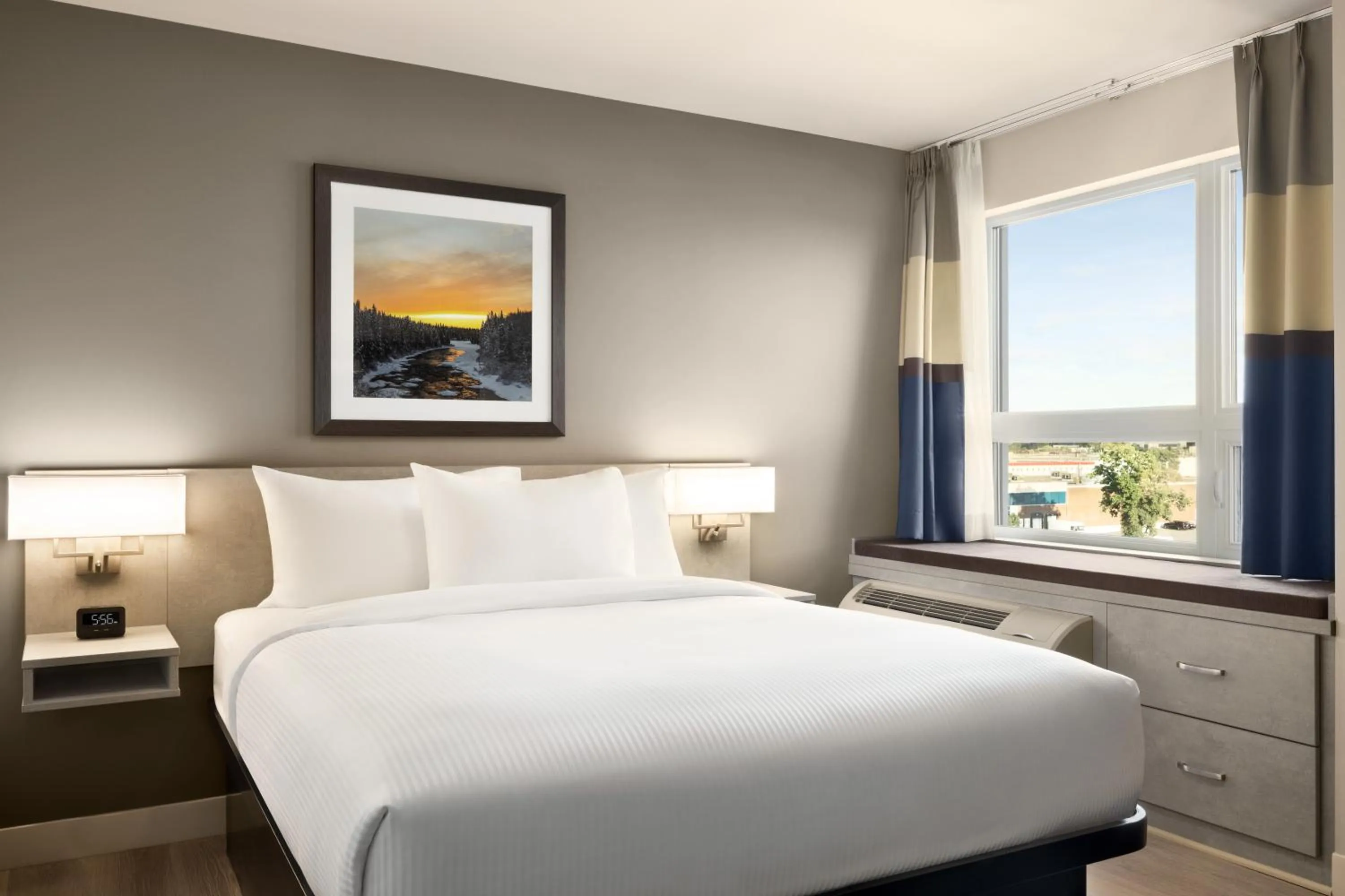 Bed in Microtel Inn & Suites by Wyndham Boisbriand
