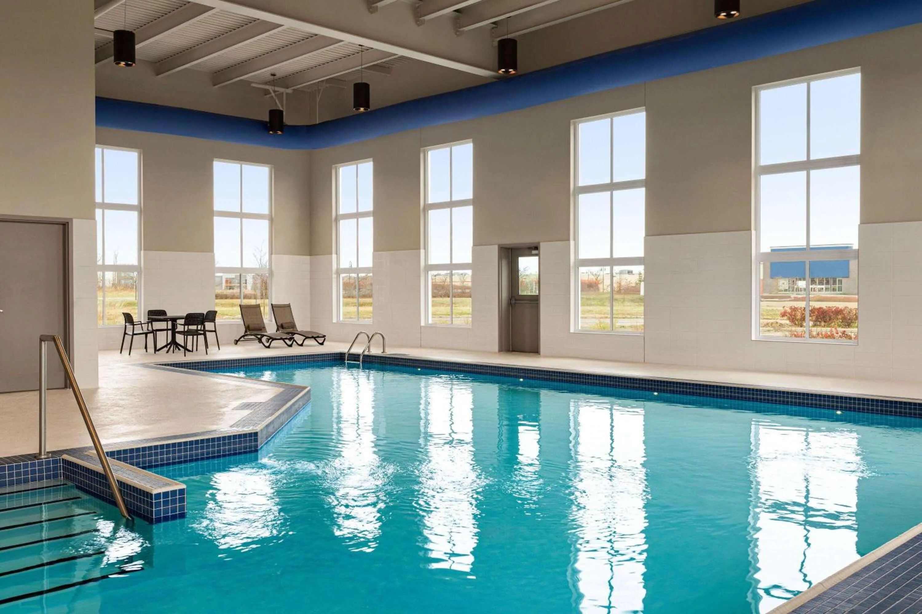 Swimming pool in Microtel Inn & Suites by Wyndham Boisbriand