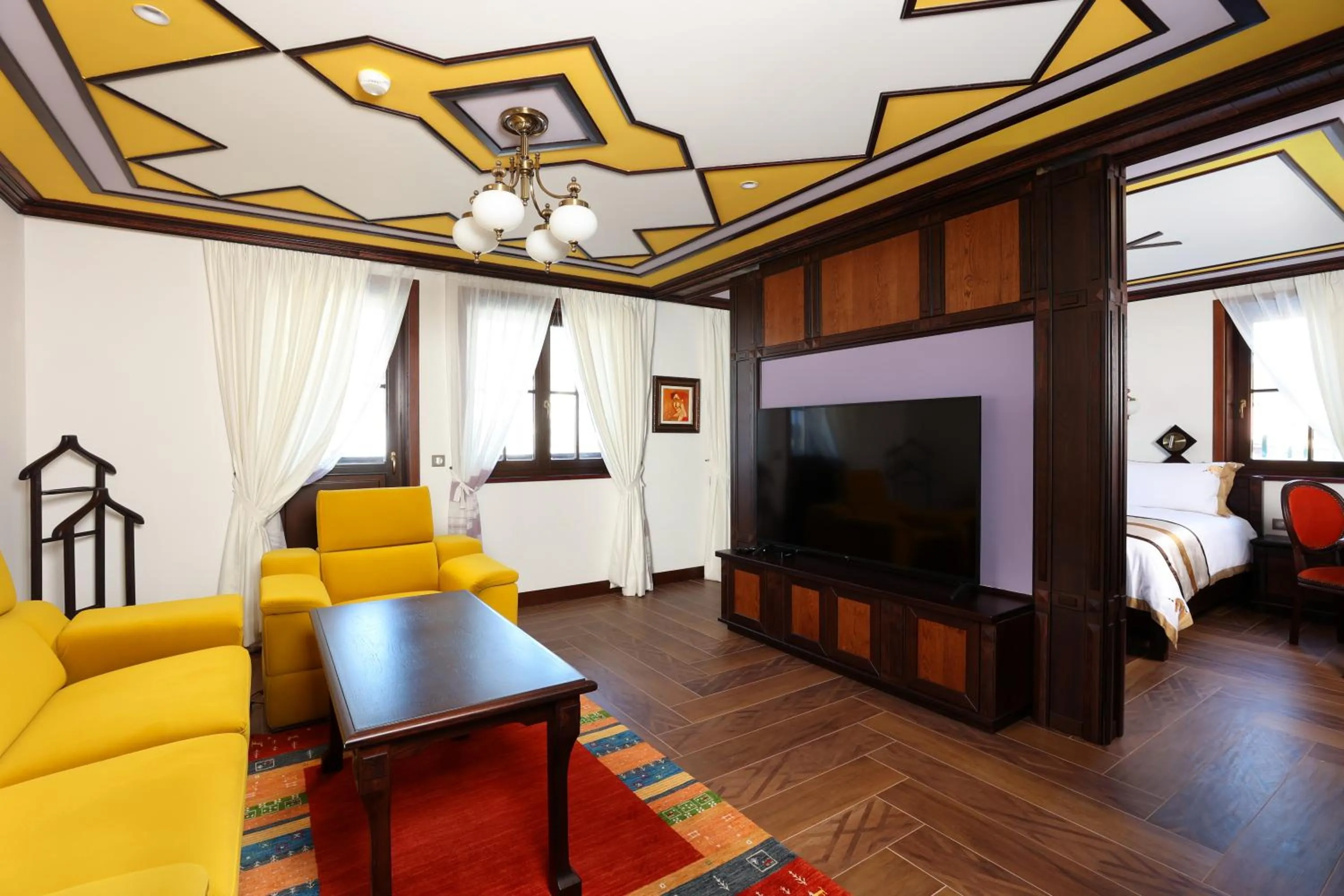 Bed in Armaco Residence