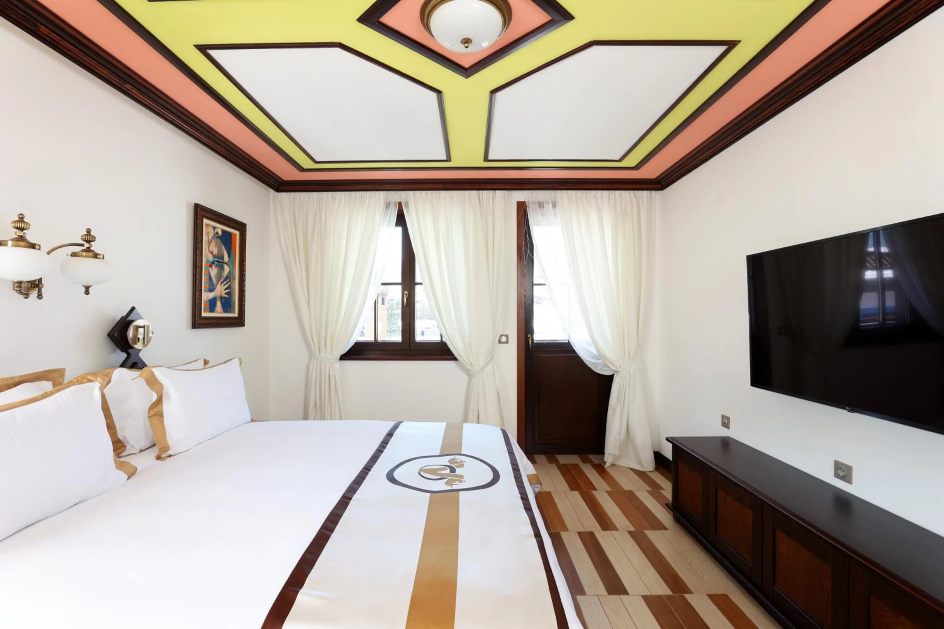 Bed in Armaco Residence