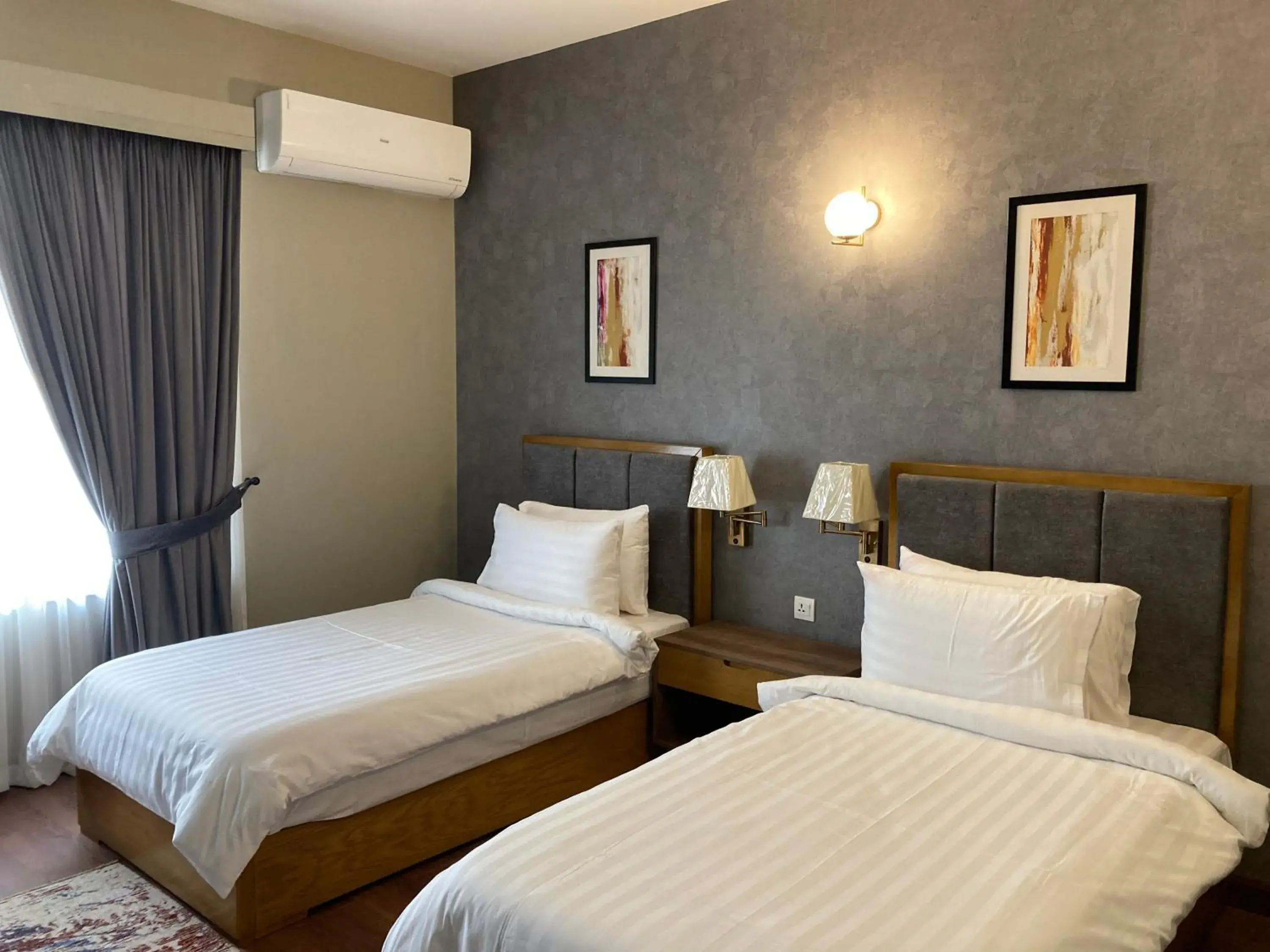 Deluxe Twin Room - single occupancy in Hillside Residence E-7 by Paramount Hospitality Deluxe Twin Room - single occupancy in Hillside Residence E-7 by Paramount Hospitality