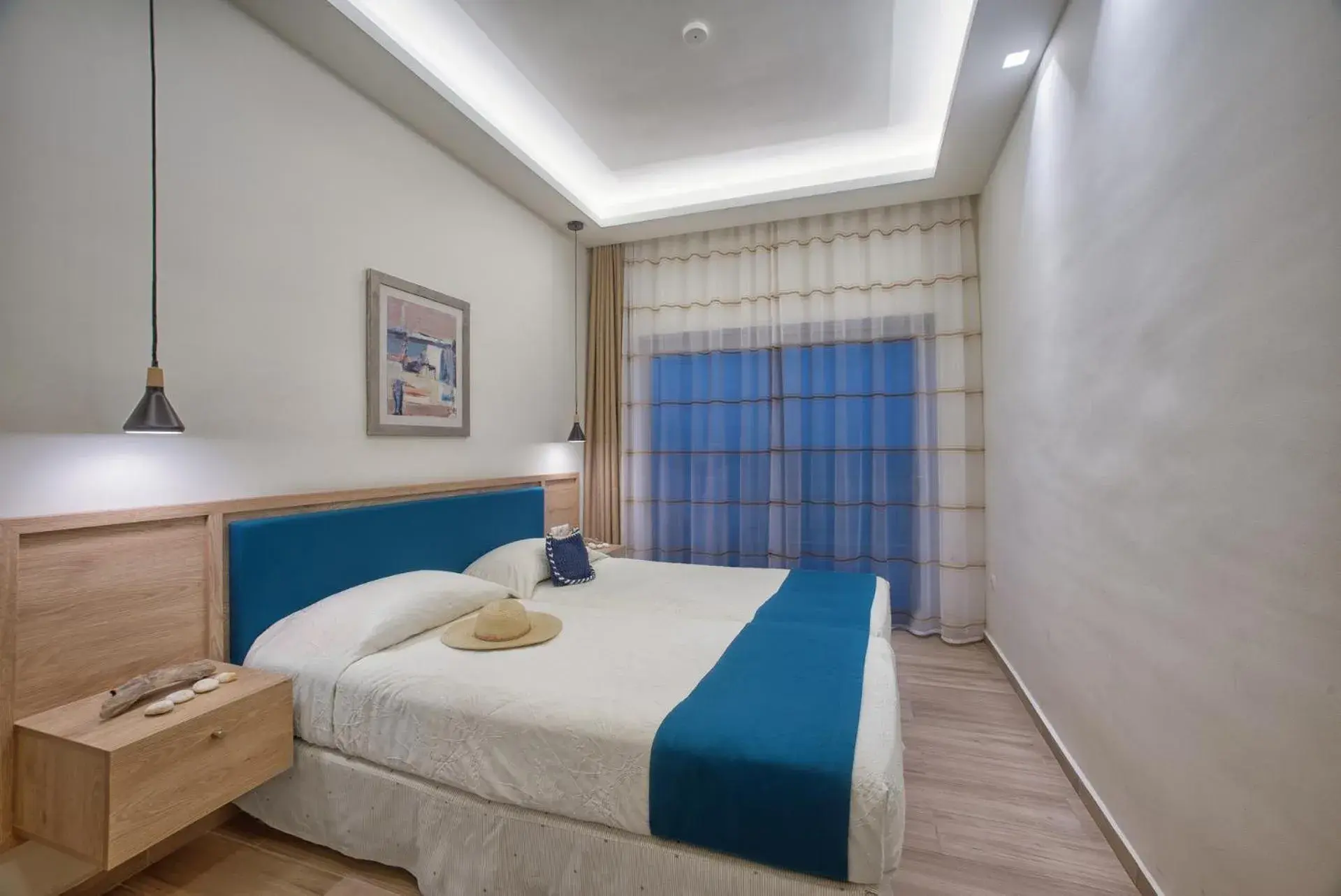 Bed in Cavos Bay Hotel & Studios Bed in Cavos Bay Hotel & Studios