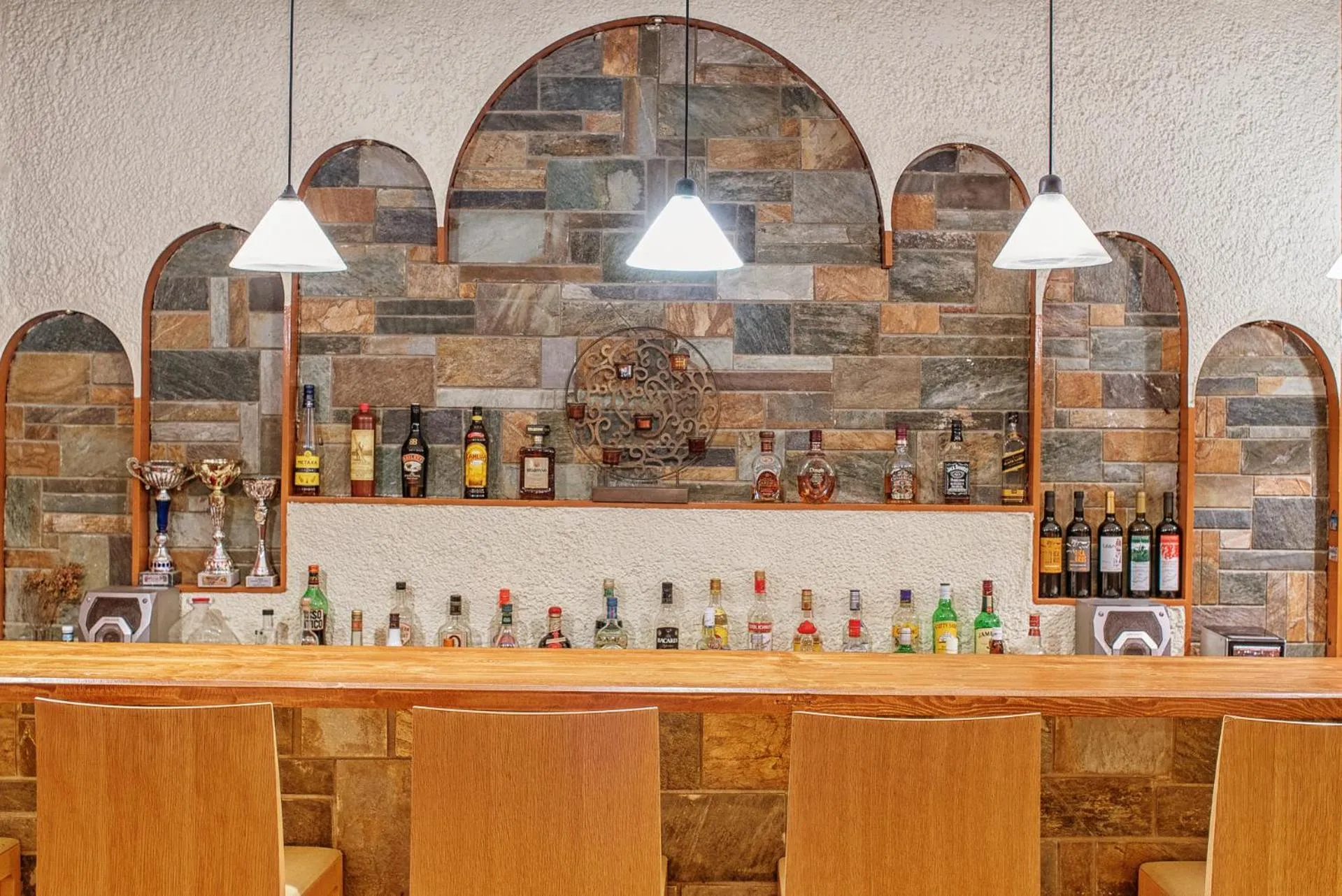Lounge or bar in Cavos Bay Hotel & Studios