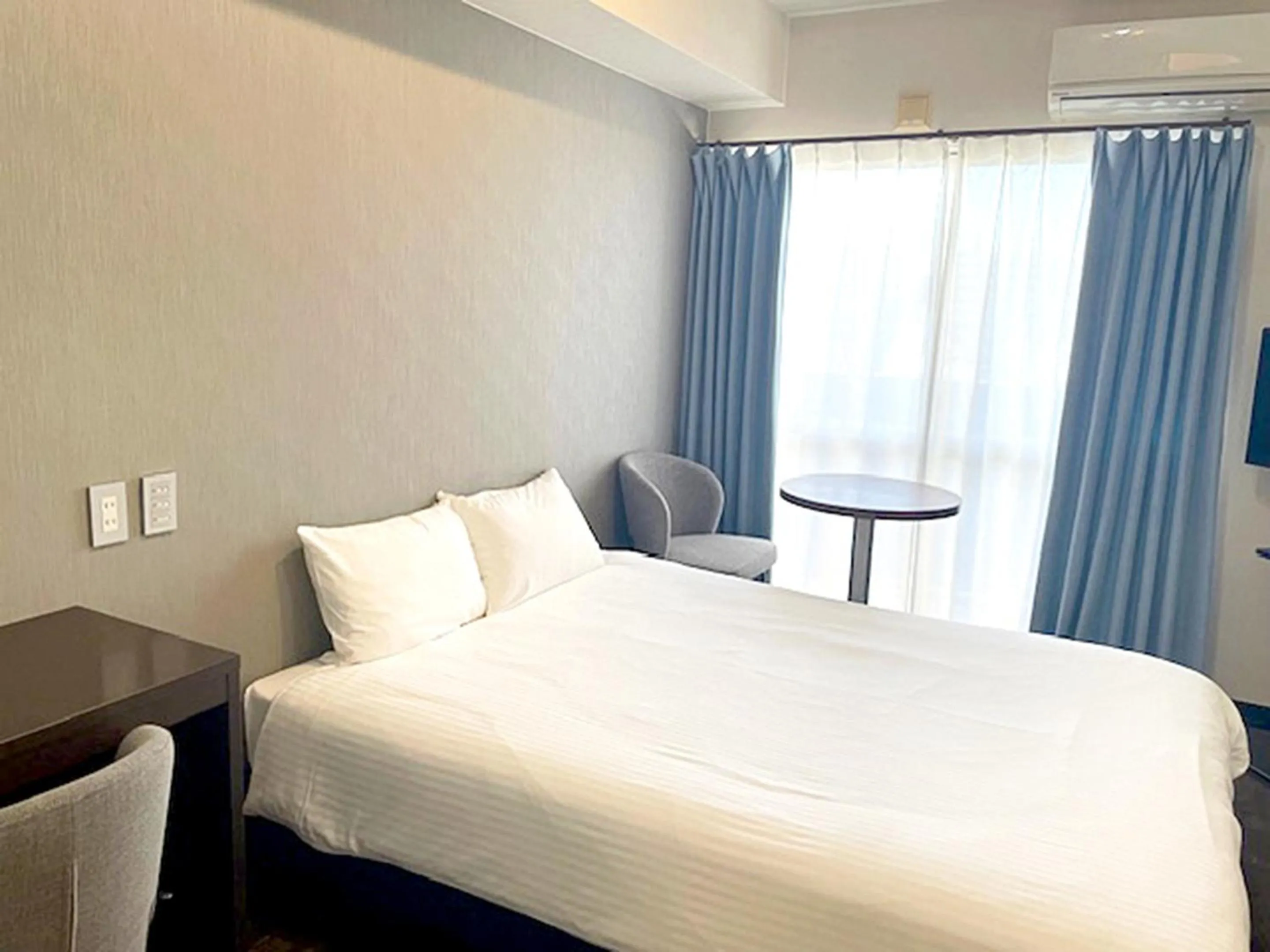 Bed in JC HOTEL NaHa