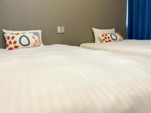 Bed in JC HOTEL NaHa