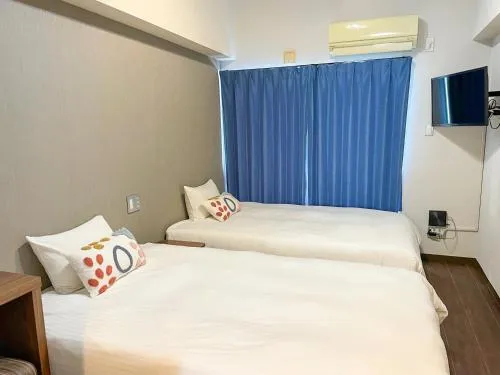 Photo of the whole room, Bed in JC HOTEL NaHa