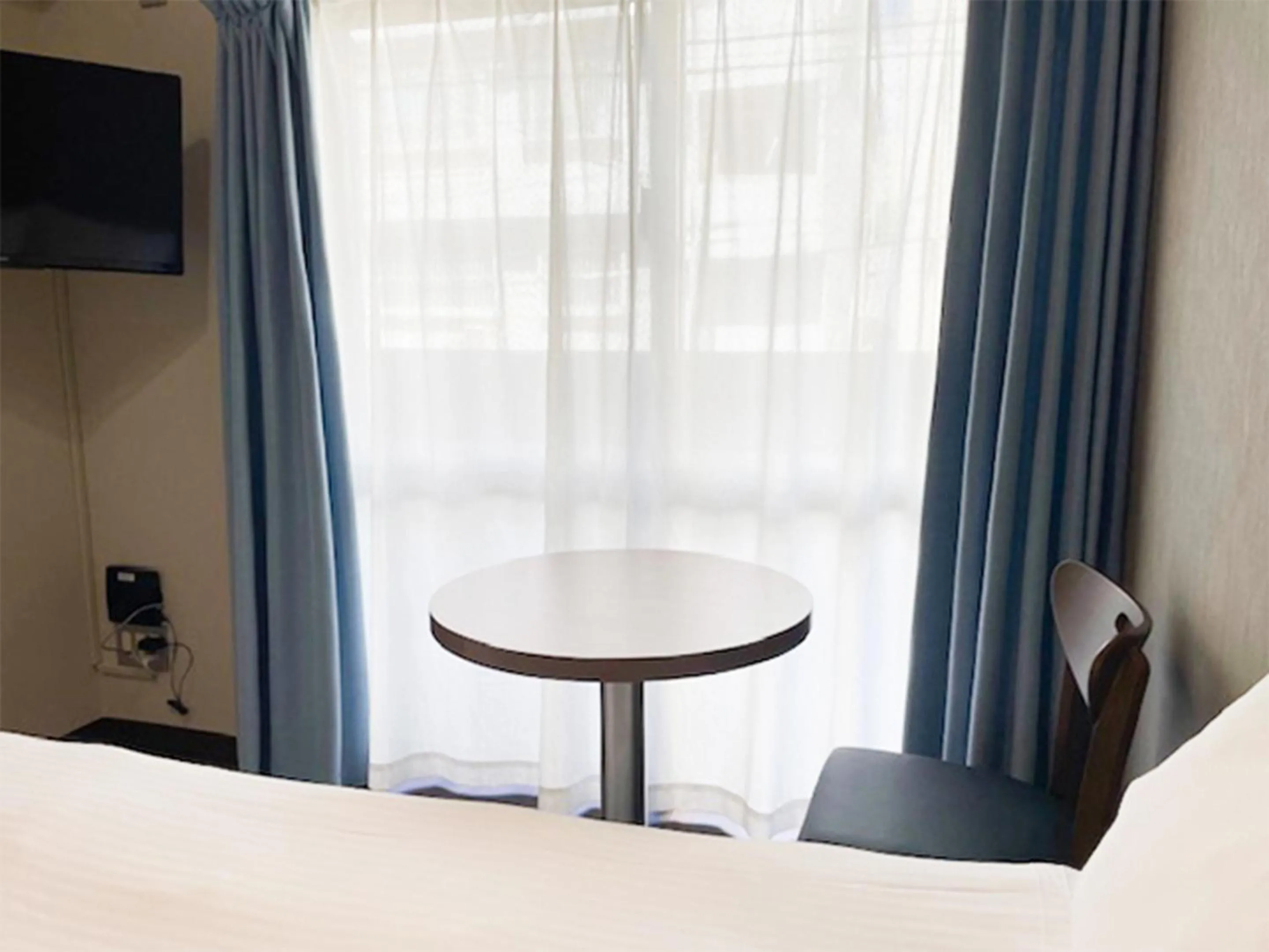 Photo of the whole room, Bed in JC HOTEL NaHa