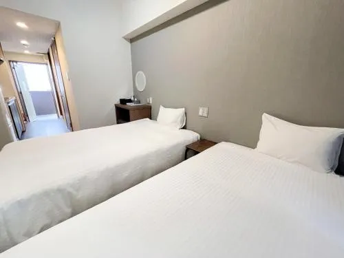 Photo of the whole room, Bed in JC HOTEL NaHa