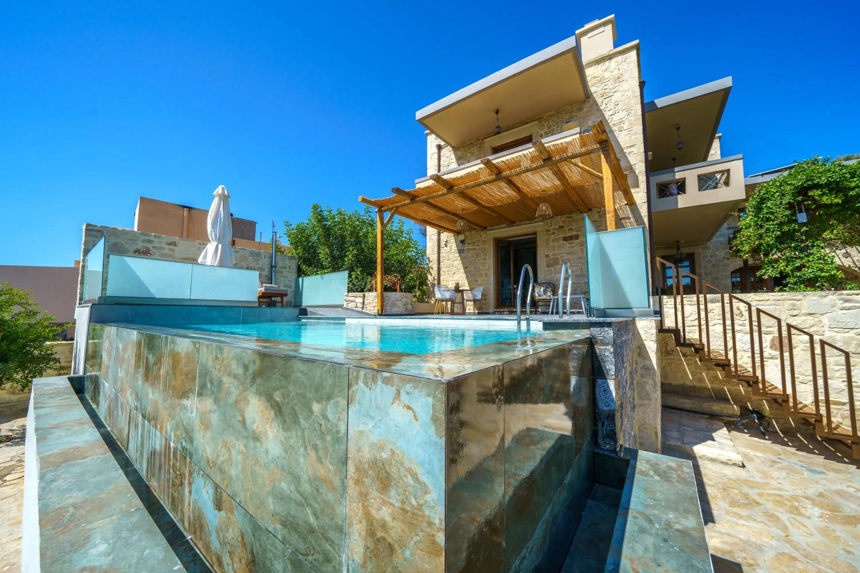 Swimming pool in Asion Lithos Suites with Private Pools