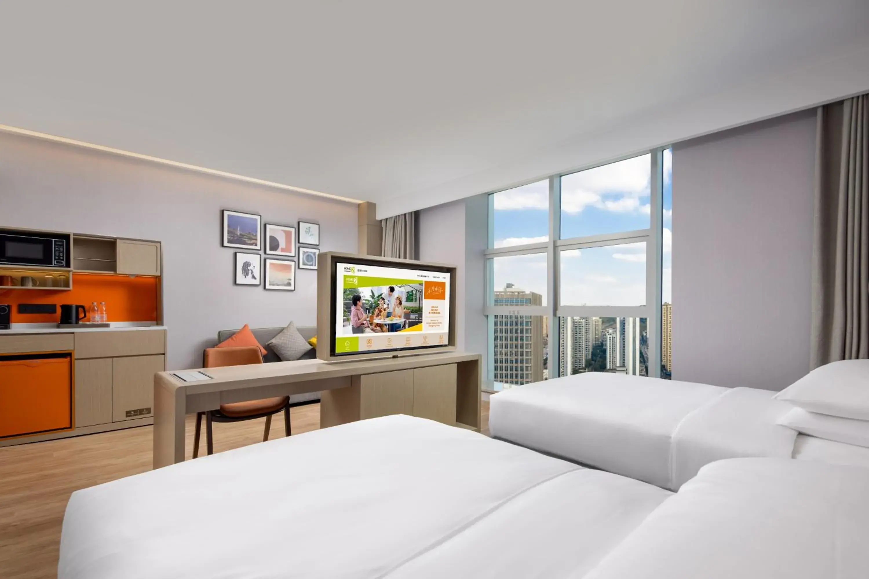 Communal lounge/ TV room, Bed in Home2 Suites by Hilton Chongqing Yubei Communal lounge/ TV room, Bed in Home2 Suites by Hilton Chongqing Yubei