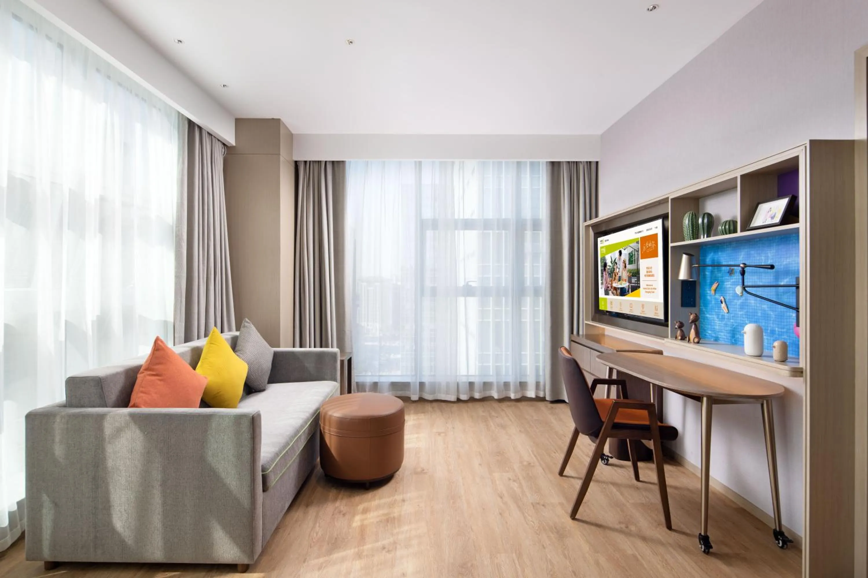 TV and multimedia in Home2 Suites by Hilton Chongqing Yubei