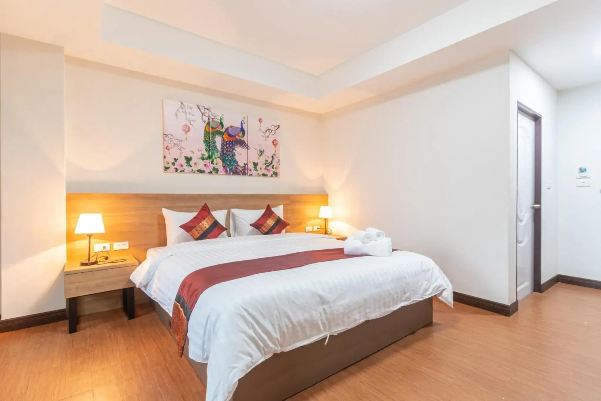 Bed in Peacock De Pai Hotel Bed in Peacock De Pai Hotel