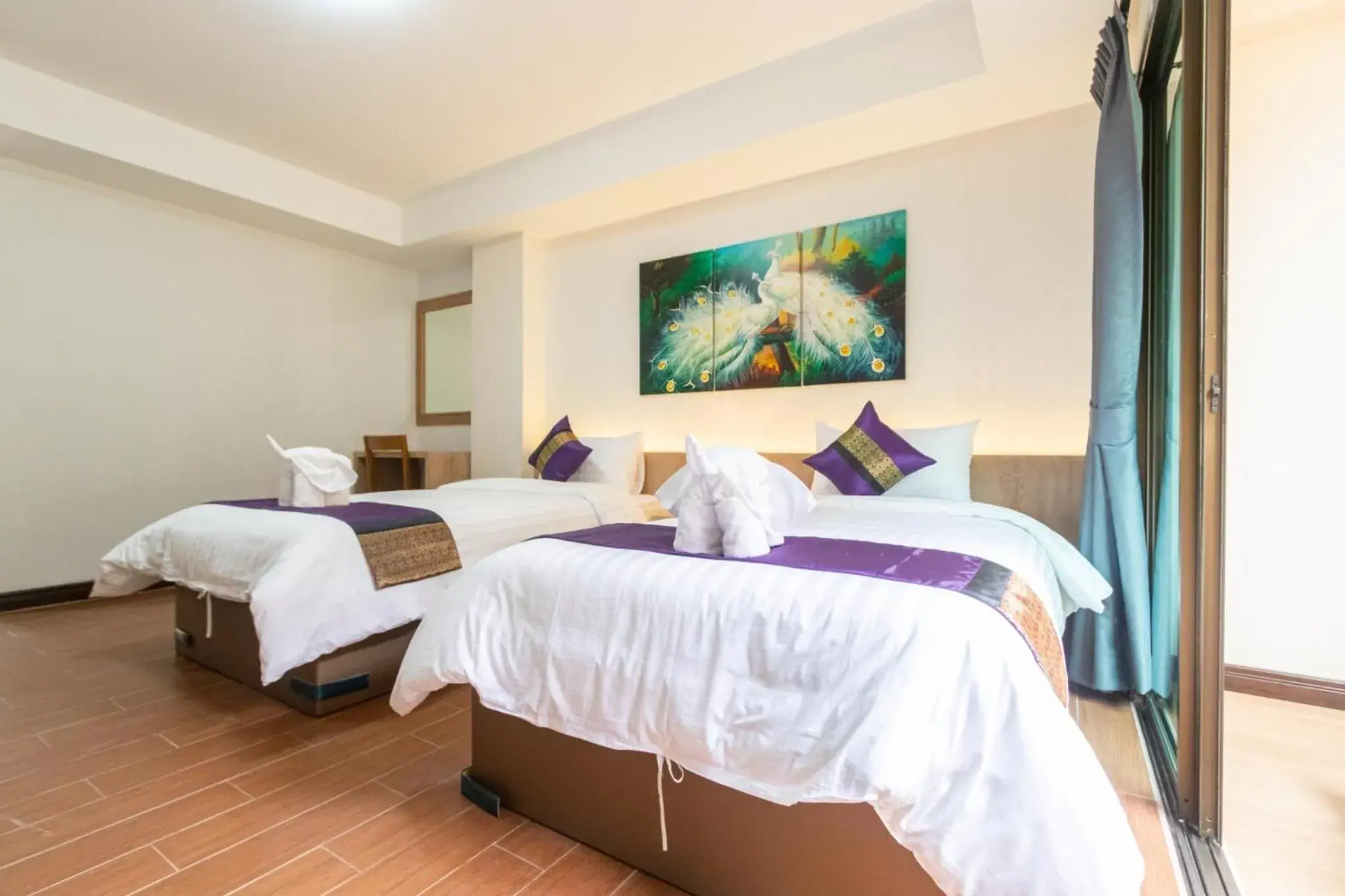 Bed in Peacock De Pai Hotel Bed in Peacock De Pai Hotel