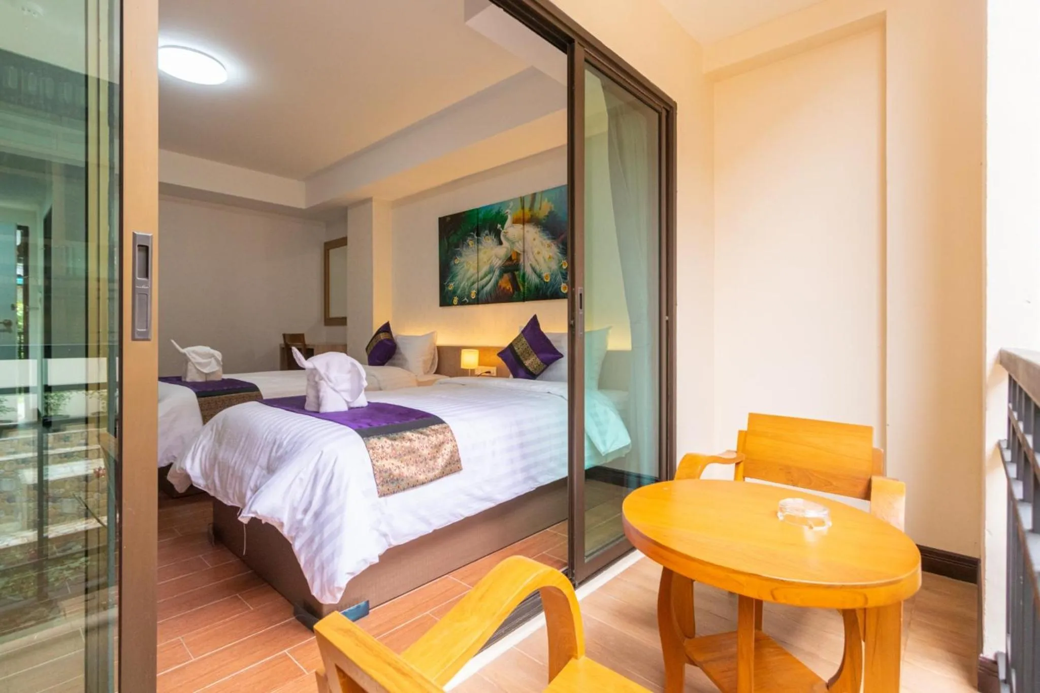 Photo of the whole room, Bed in Peacock De Pai Hotel