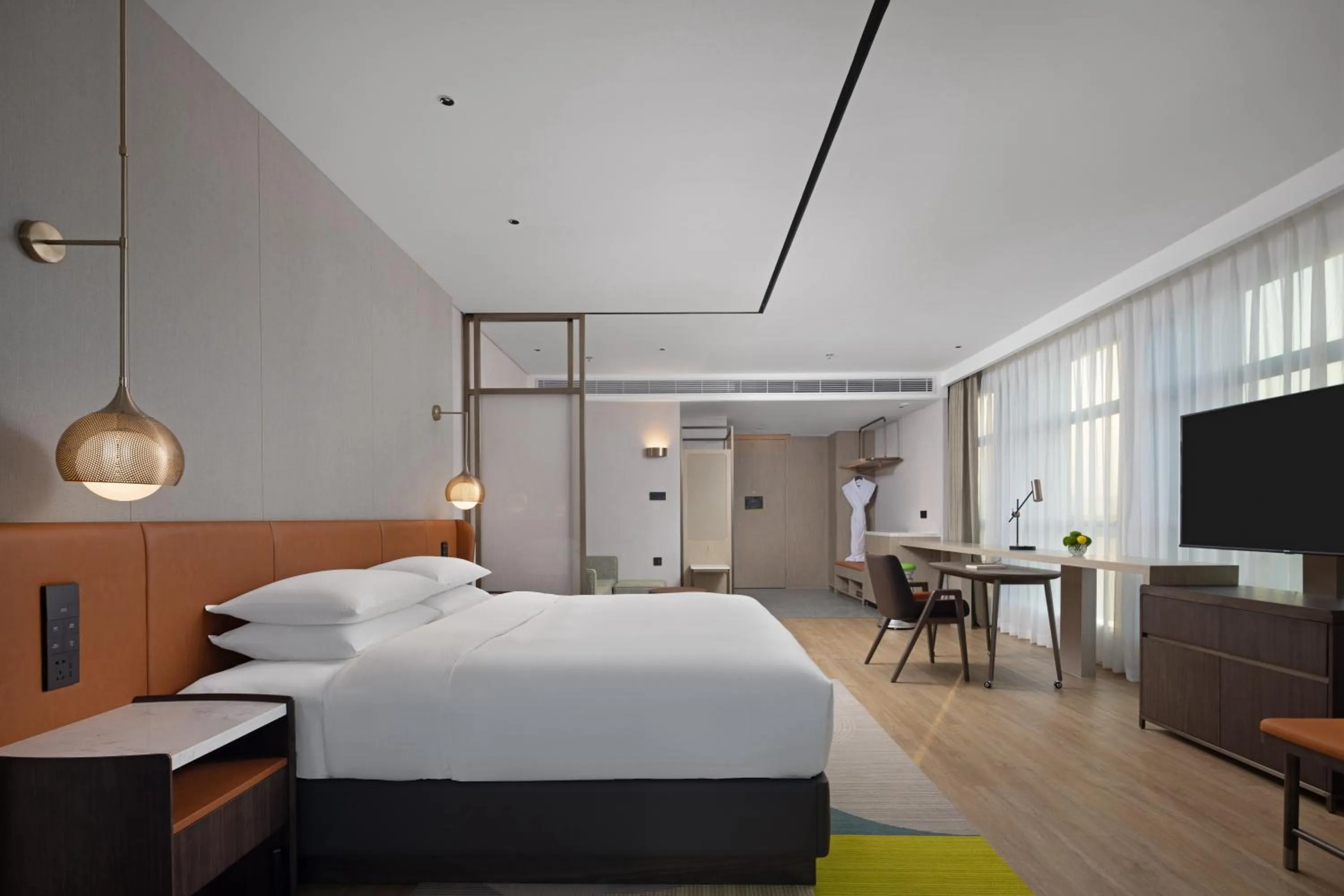 Communal lounge/ TV room, Bed in Home2 Suites by Hilton Guiyang Nanming Jiyuan