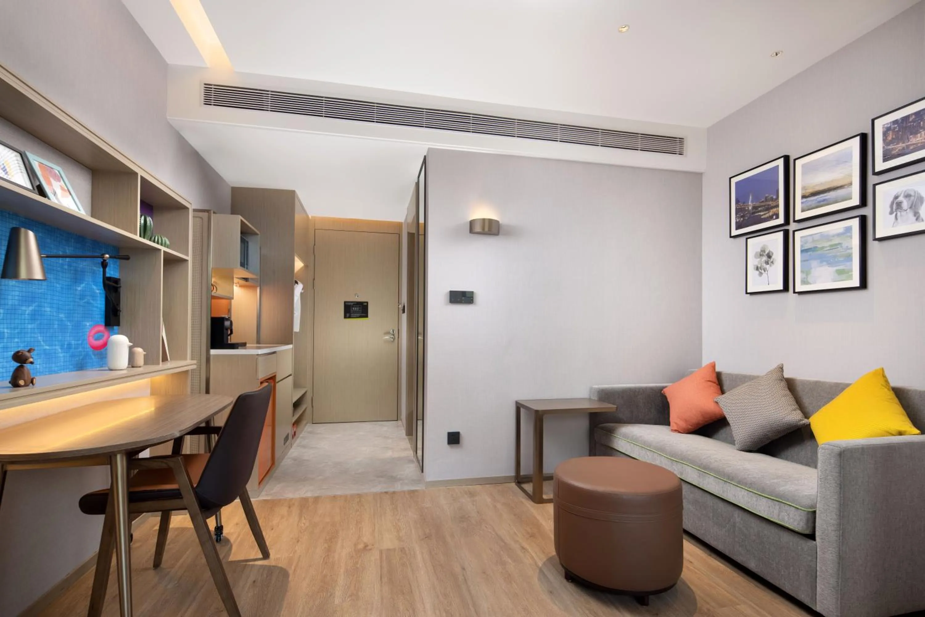 Living room in Home2 Suites By Hilton Wuhan Xudong