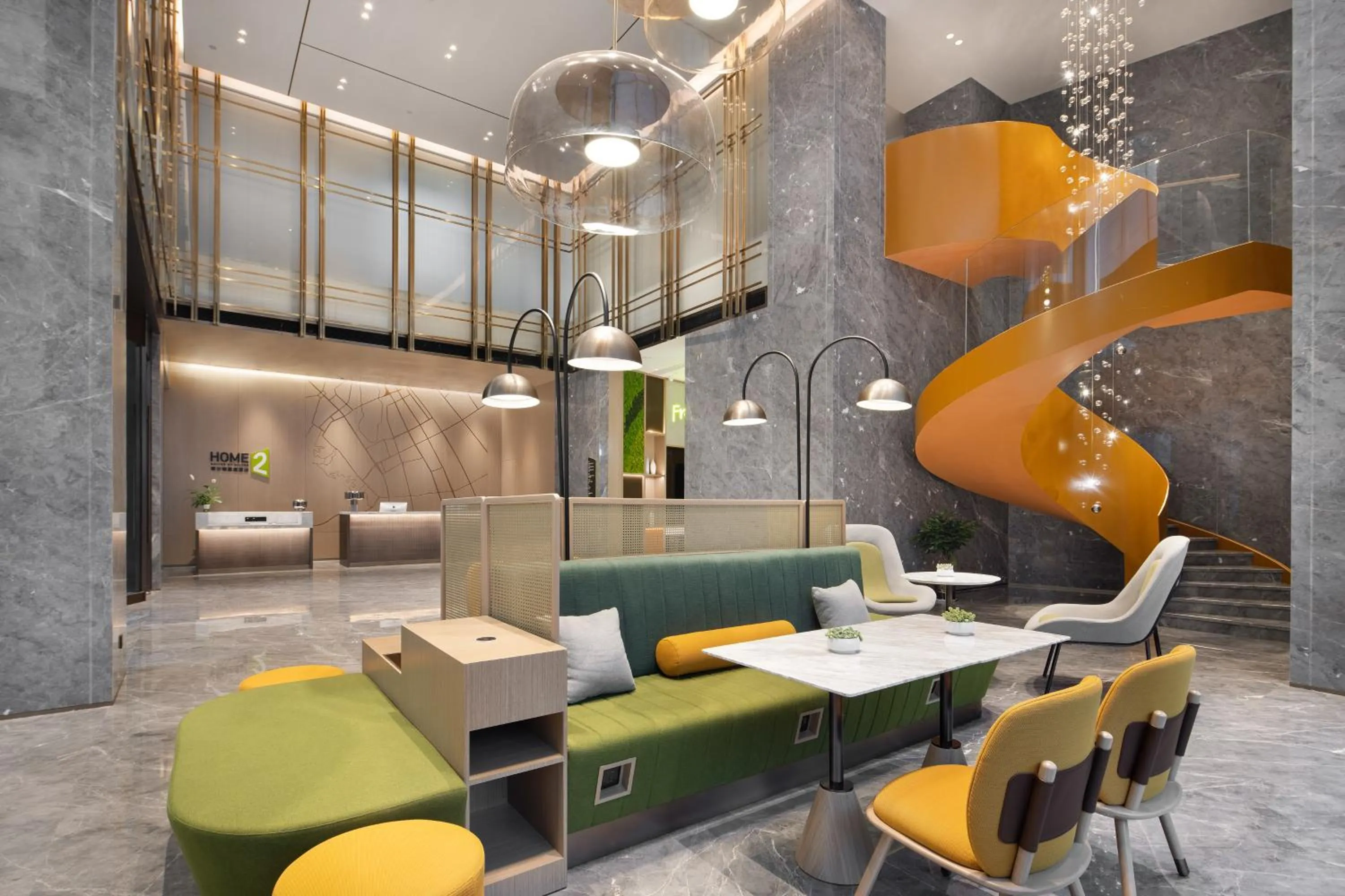 Communal lounge/ TV room in Home2 Suites By Hilton Wuhan Xudong