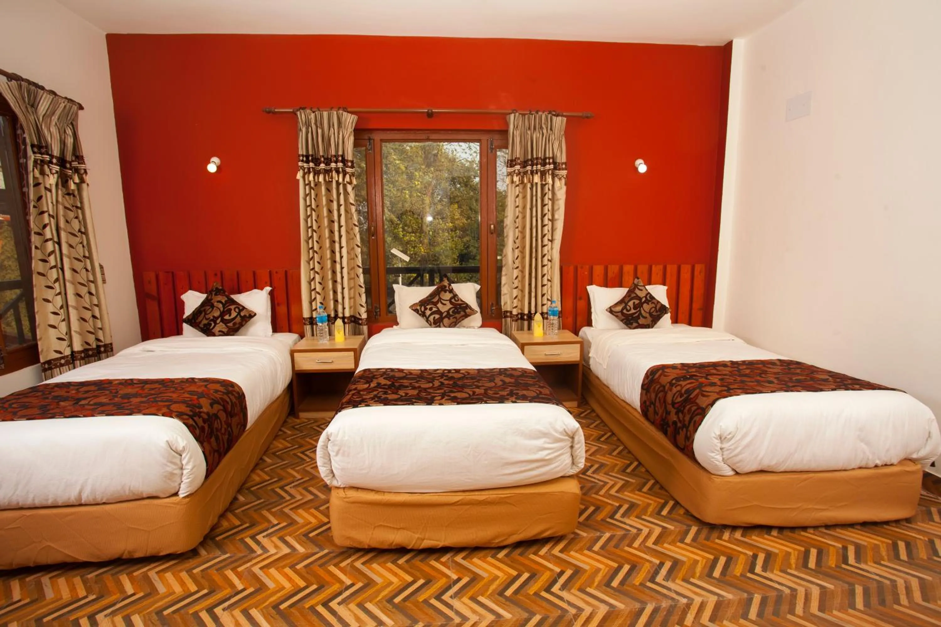 Bedroom, Bed in Sauraha Holiday Home Riverside by managed Hotel Surya Adventure