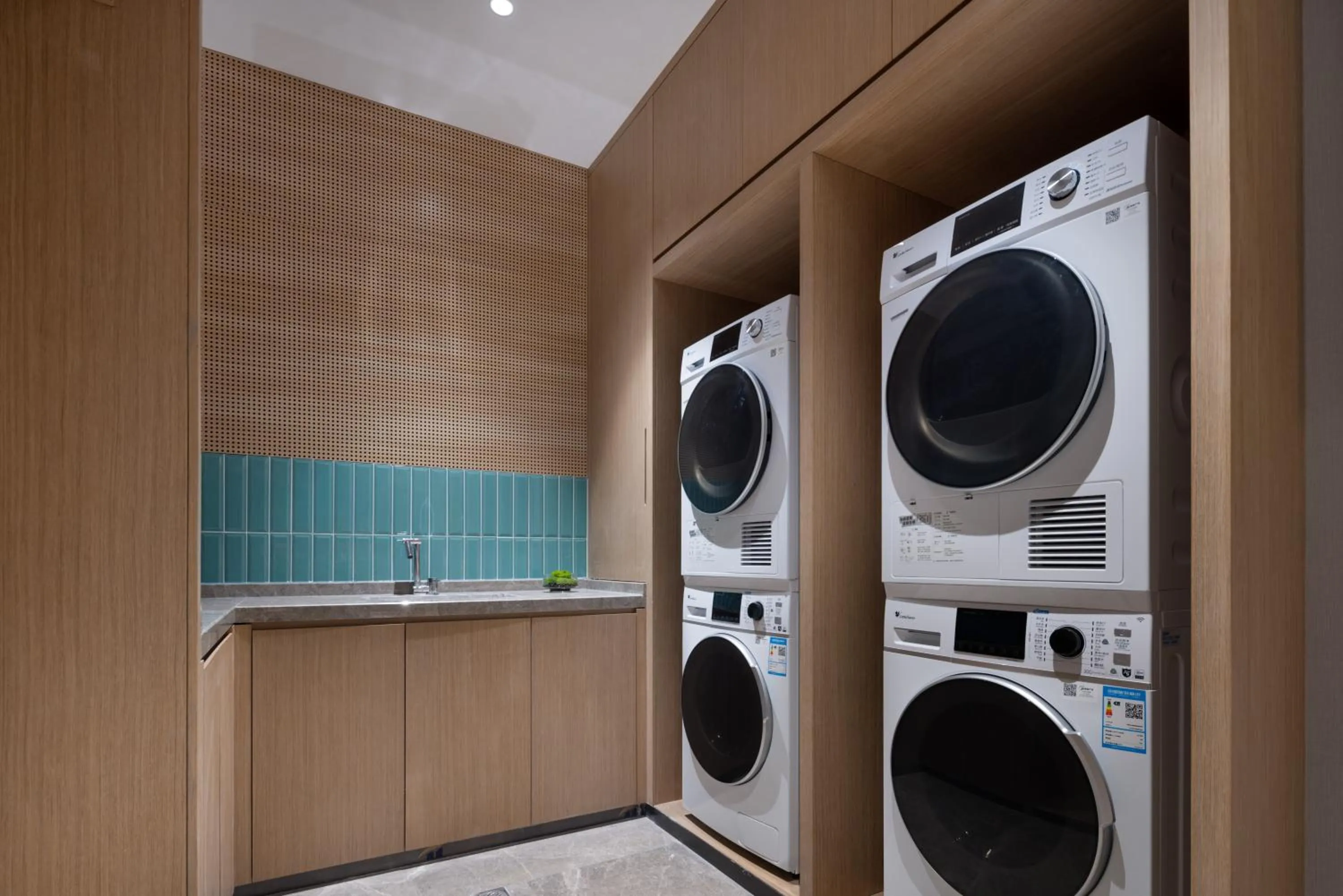 washing machine in Home2 Suites By Hilton Foshan Jiujiang
