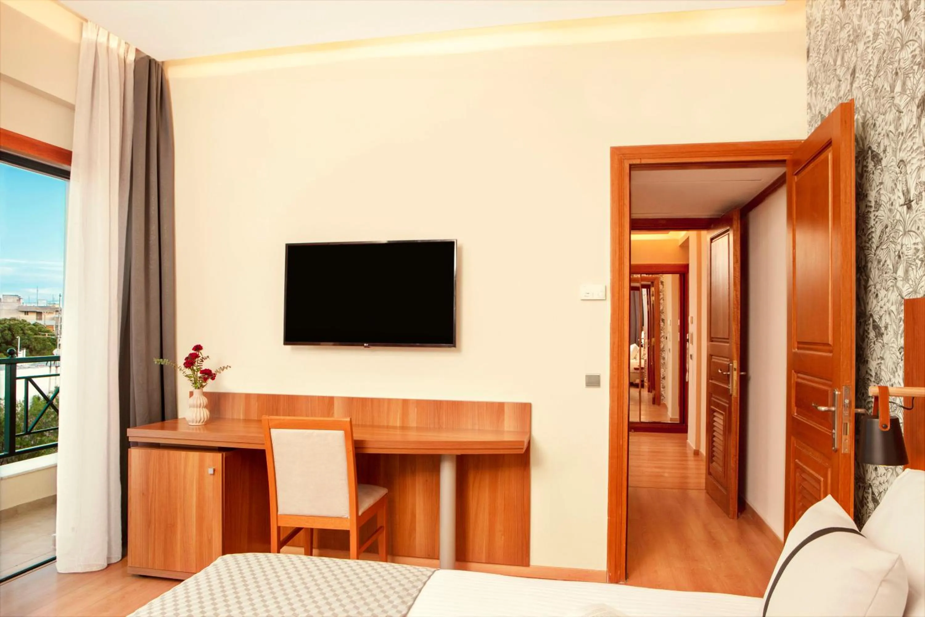 Bed in Zeus Essence Ramada by Wyndham Athens