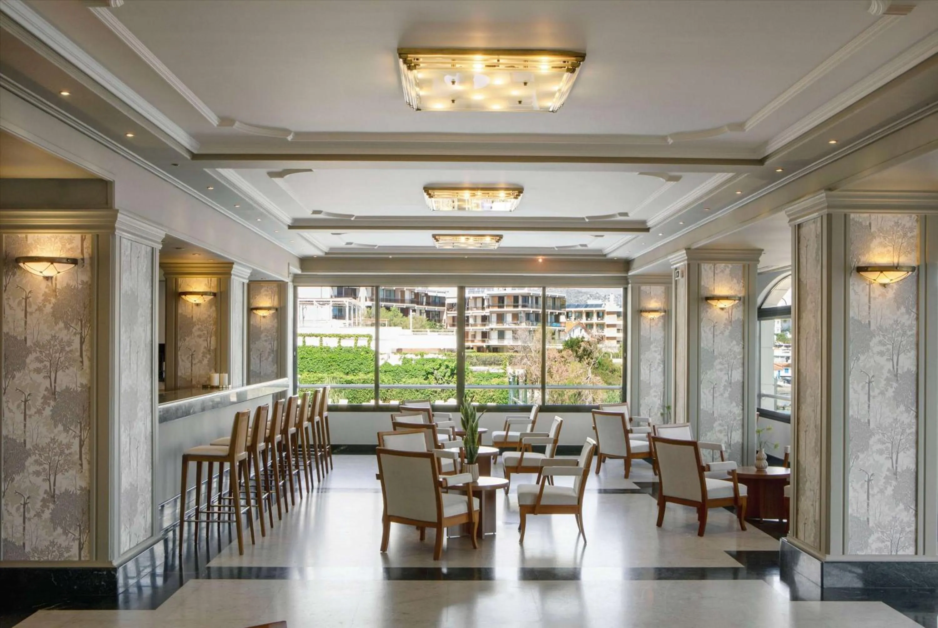 Lounge or bar in Zeus Essence Ramada by Wyndham Athens