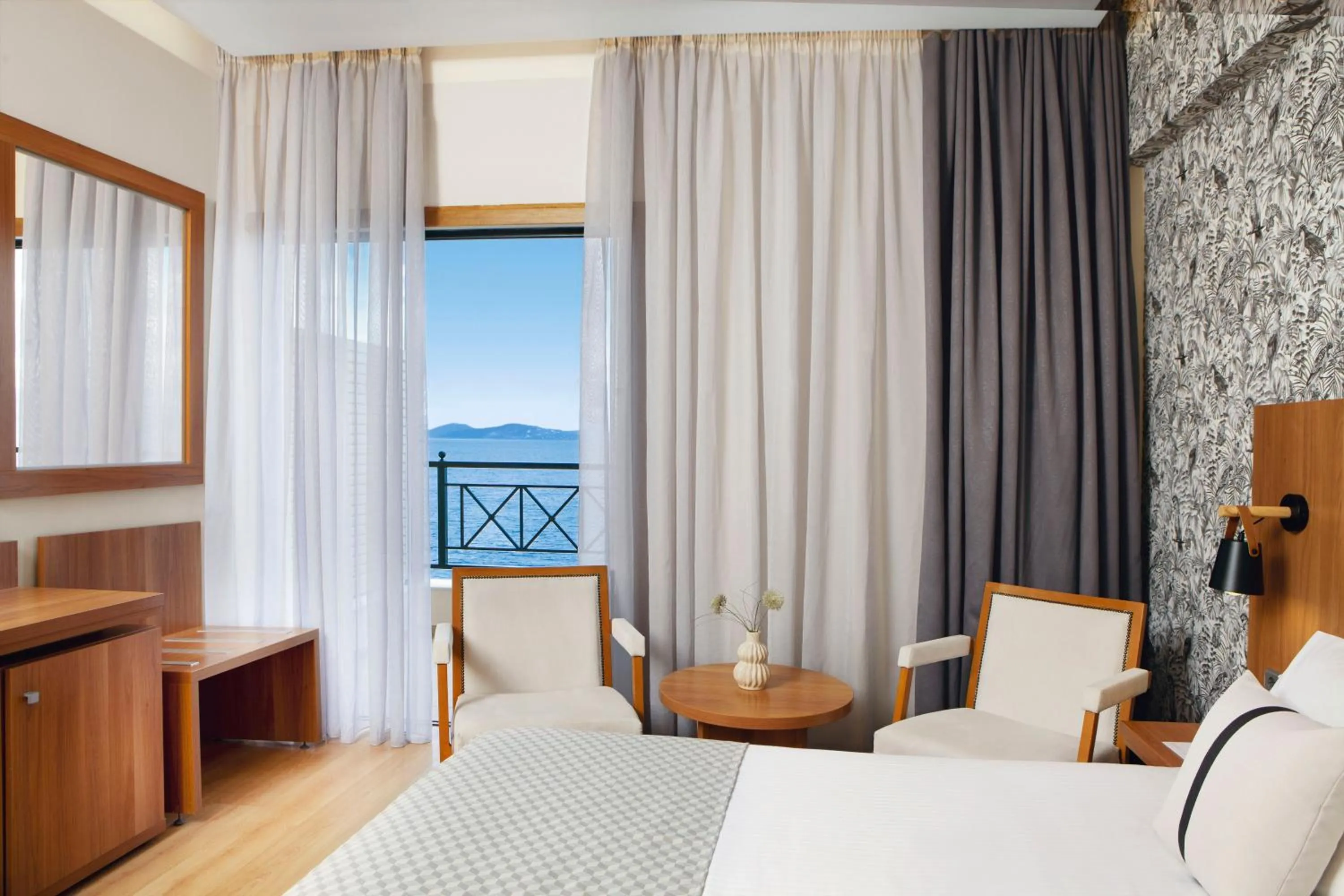 Bed in Zeus Essence Ramada by Wyndham Athens