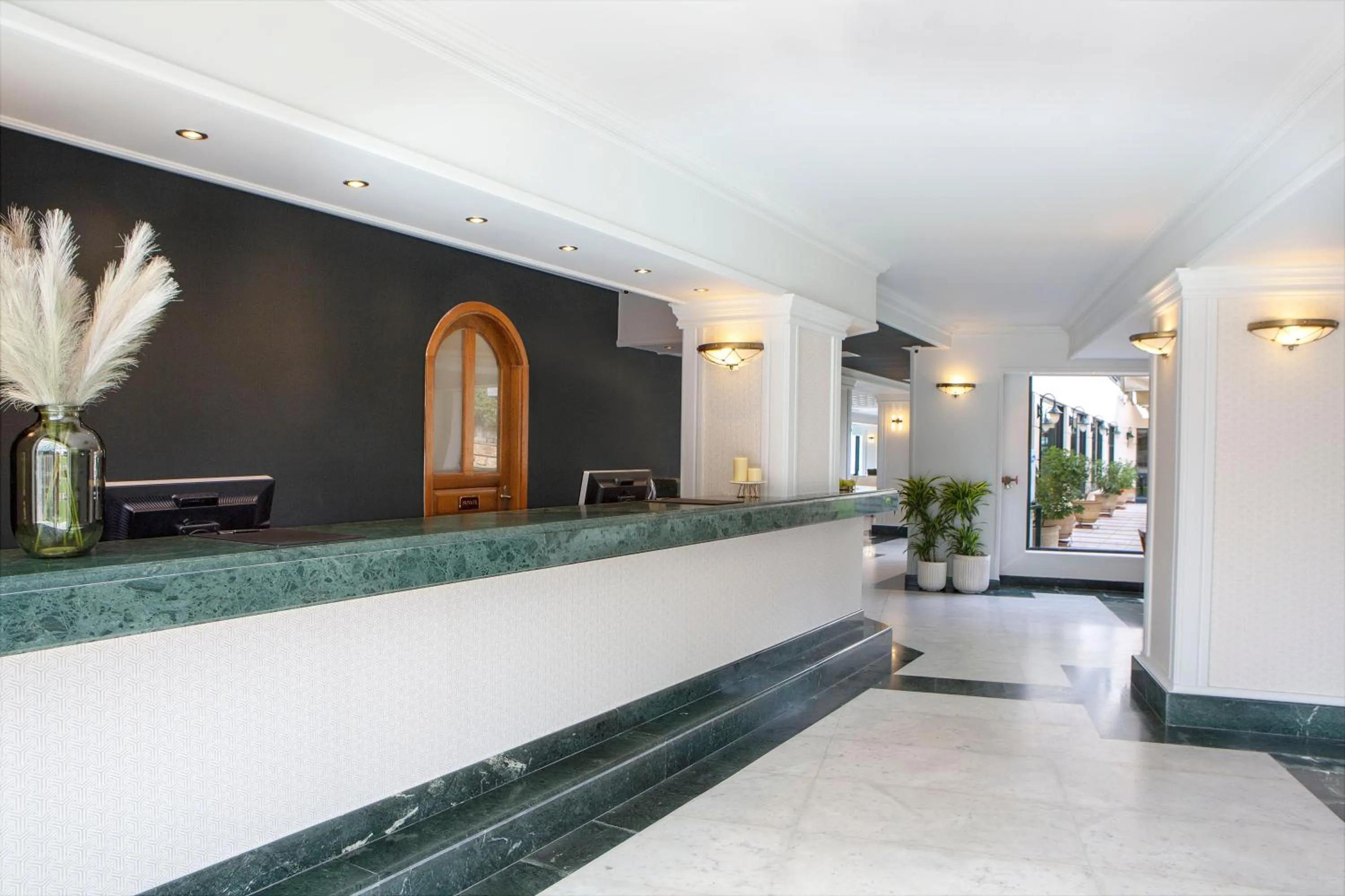 Lobby or reception in Zeus Essence Ramada by Wyndham Athens