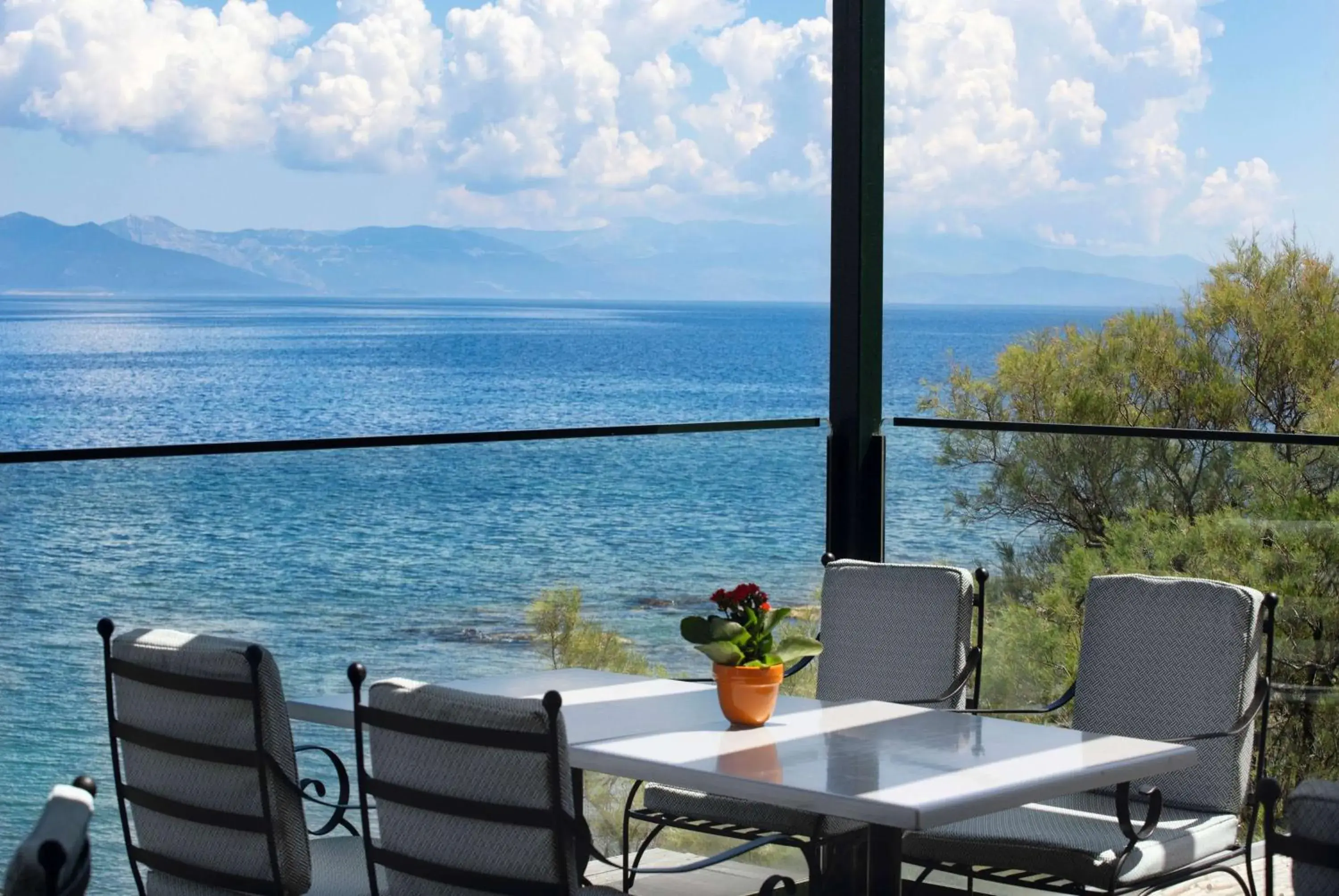 Lounge or bar in Ramada by Wyndham , Athens Club Attica Riviera Lounge or bar in Ramada by Wyndham , Athens Club Attica Riviera