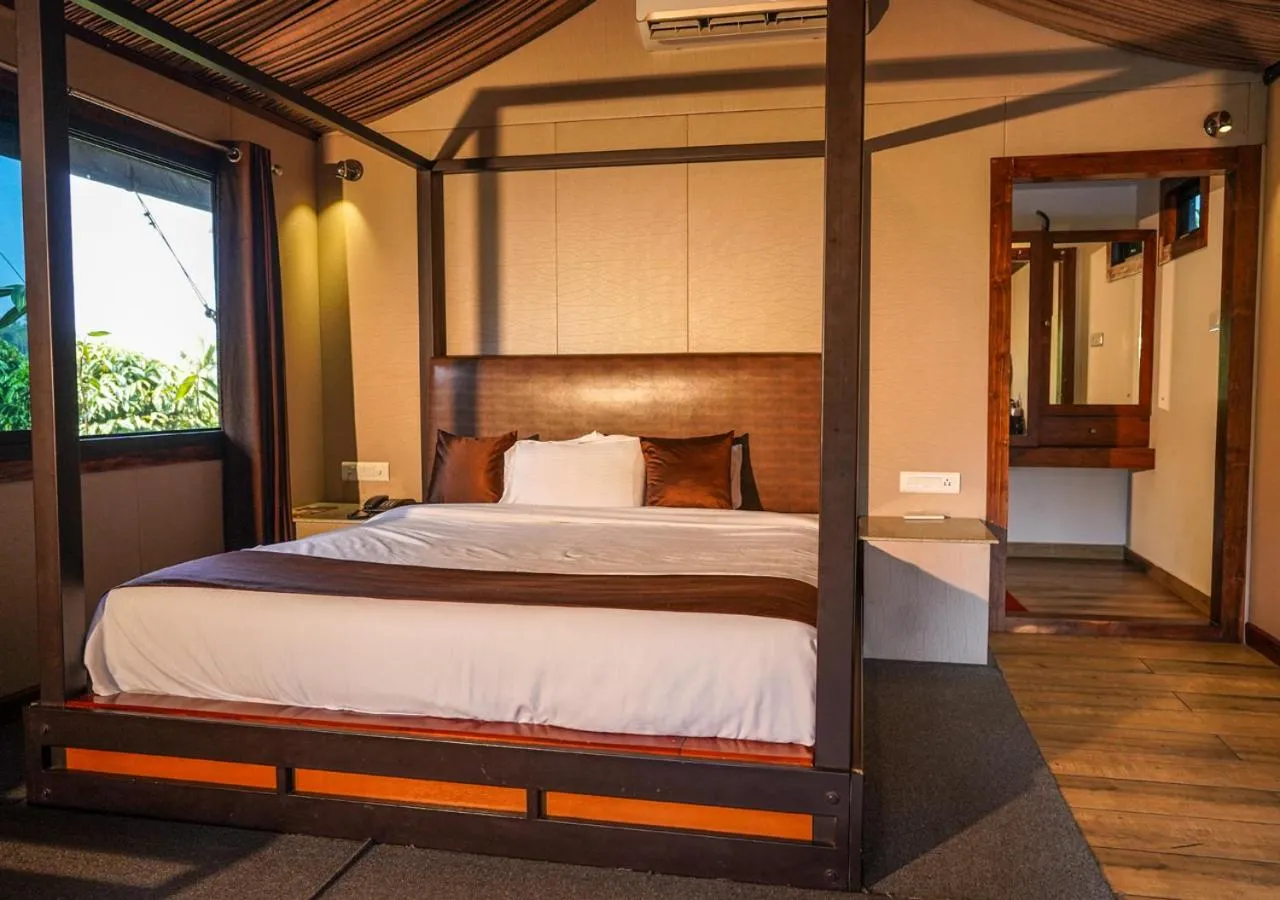 Bed in Niyatma Wayanad Pool Resort by VOYE HOMES - Inside Coffee Plantation