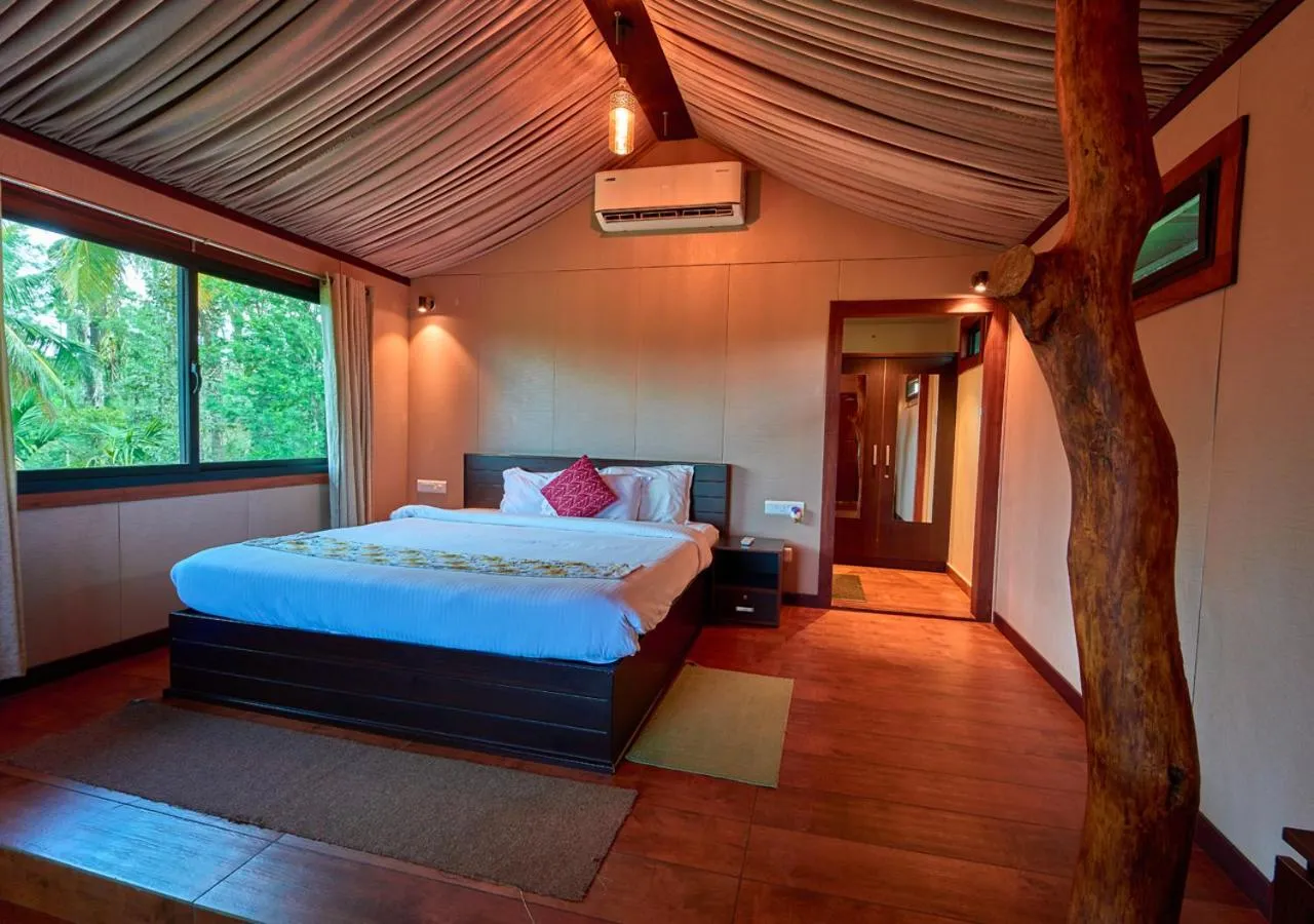 Bed in Niyatma Wayanad Pool Resort by VOYE HOMES - Inside Coffee Plantation
