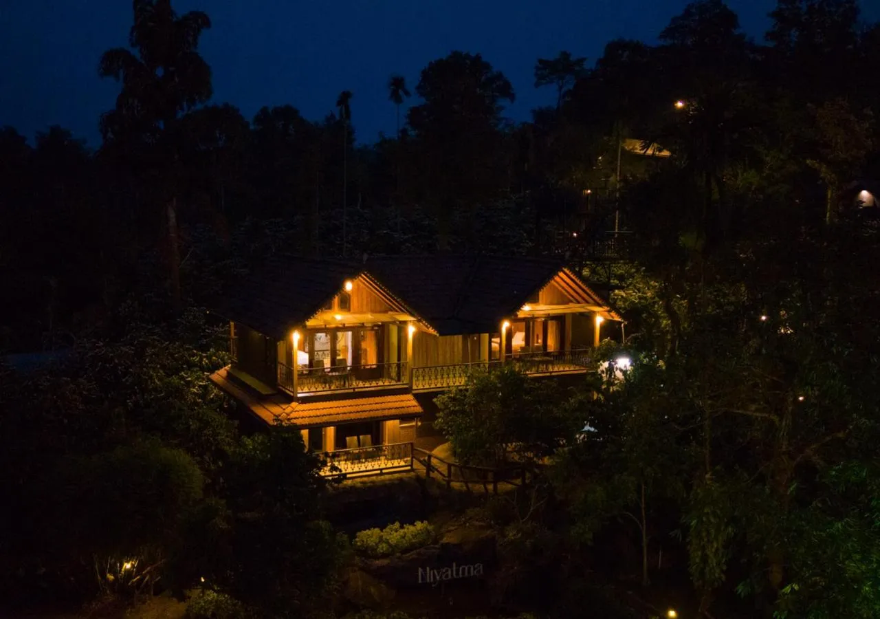 Property building in Niyatma Wayanad Pool Resort by VOYE HOMES - Inside Coffee Plantation