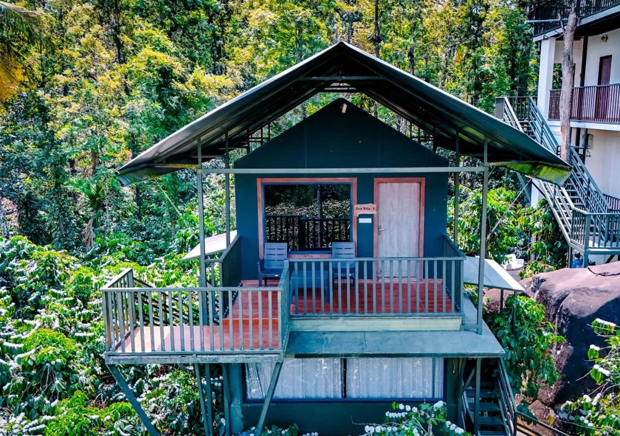 Property building in Niyatma Wayanad Pool Resort by VOYE HOMES - Inside Coffee Plantation