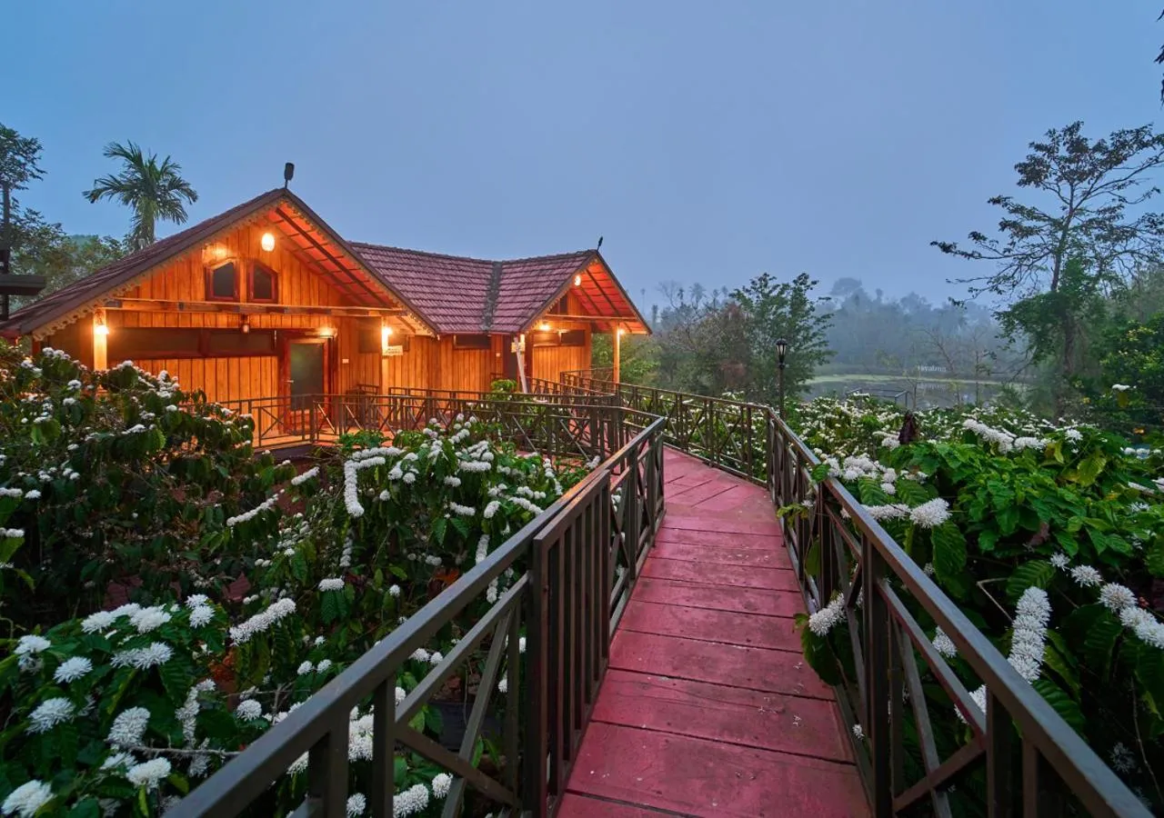 Property building in Niyatma Wayanad Pool Resort by VOYE HOMES - Inside Coffee Plantation