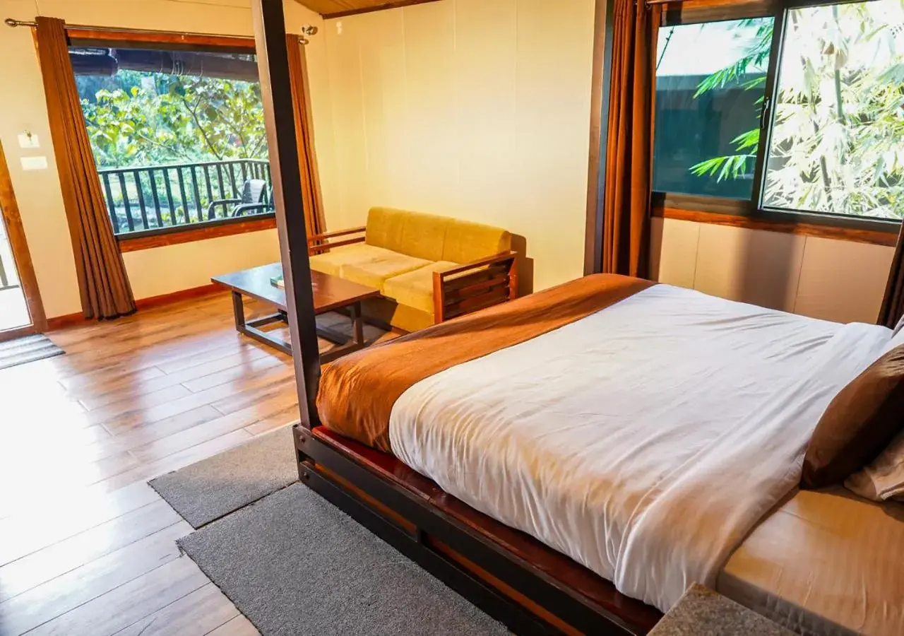 Egyptian Deluxe Cottage - single occupancy in Niyatma Wayanad Pool Resort by VOYE HOMES - Inside Coffee Plantation Egyptian Deluxe Cottage - single occupancy in Niyatma Wayanad Pool Resort by VOYE HOMES - Inside Coffee Plantation