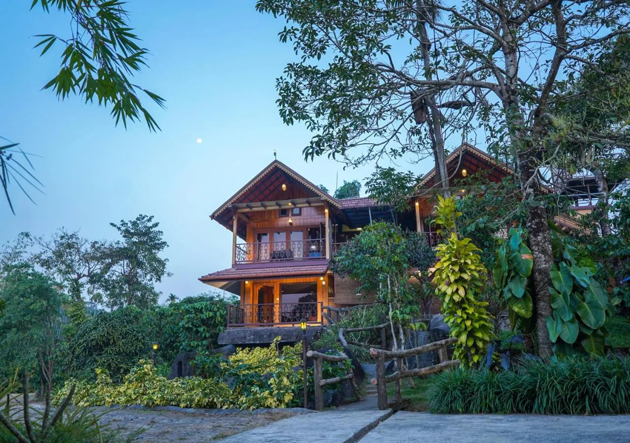 Property building in Niyatma Wayanad Pool Resort by VOYE HOMES - Inside Coffee Plantation