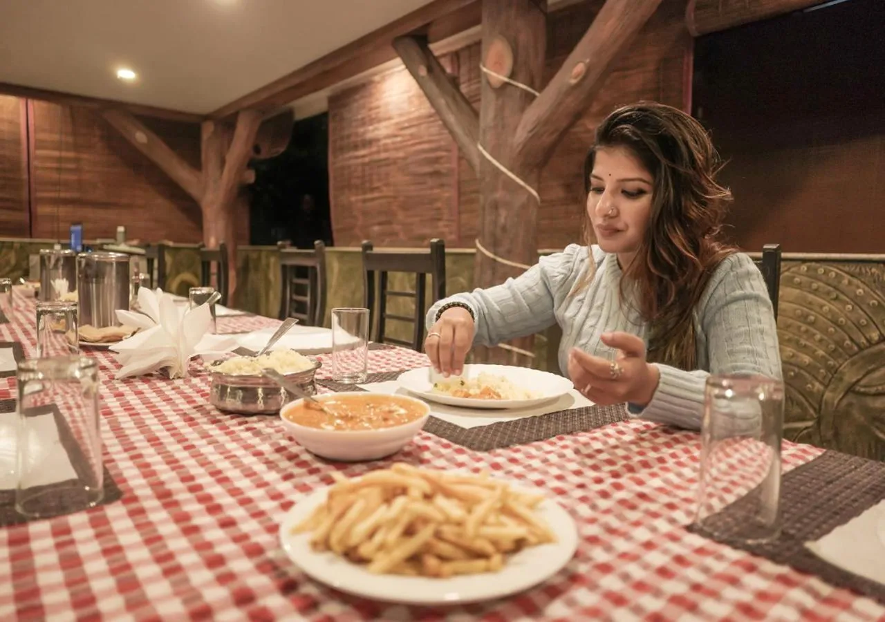 Restaurant/places to eat in Niyatma Wayanad Pool Resort by VOYE HOMES - Inside Coffee Plantation