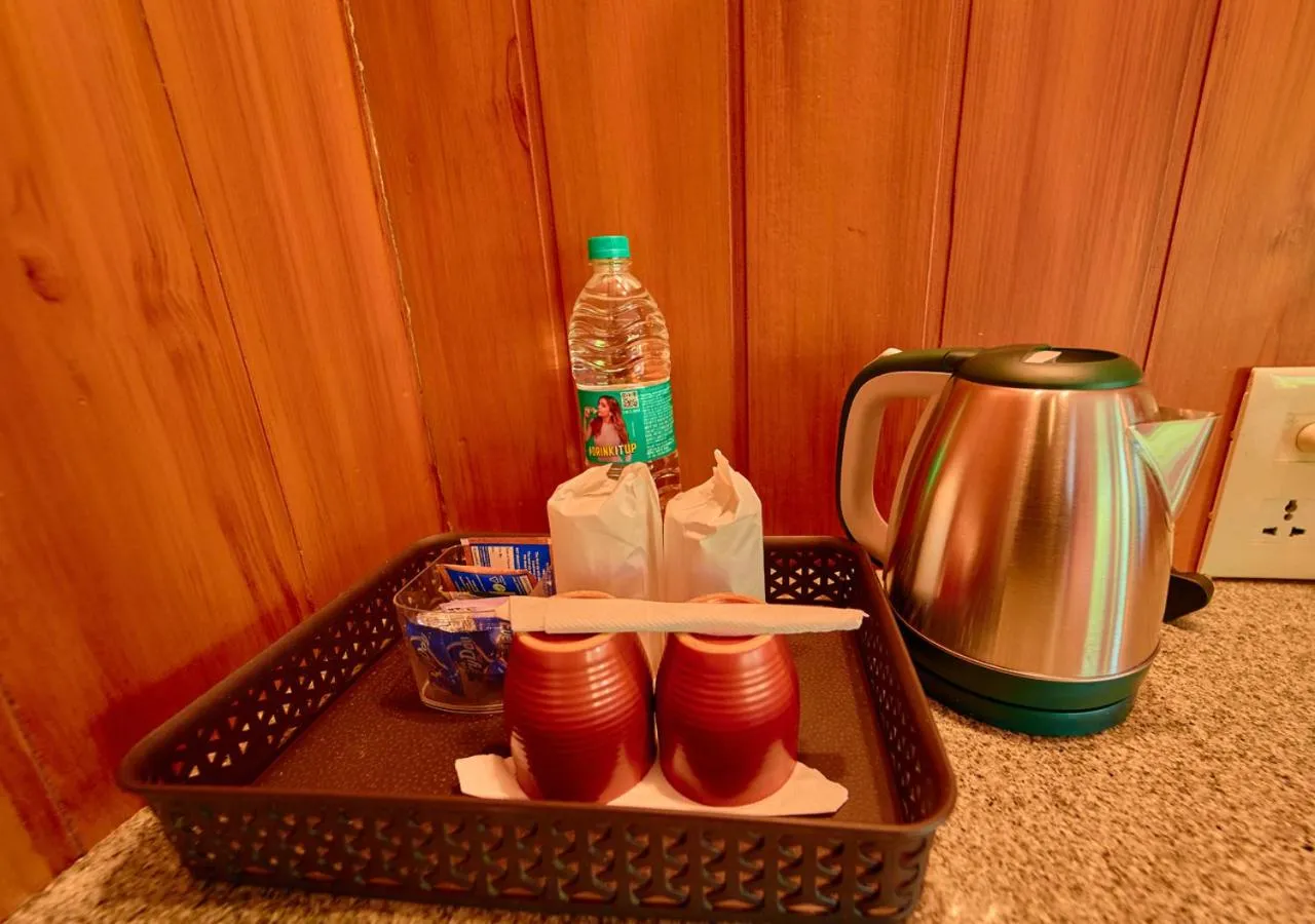 Coffee/tea facilities in Niyatma Wayanad Pool Resort by VOYE HOMES - Inside Coffee Plantation