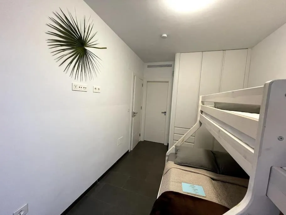 Bed in Modern Apartment with pool area