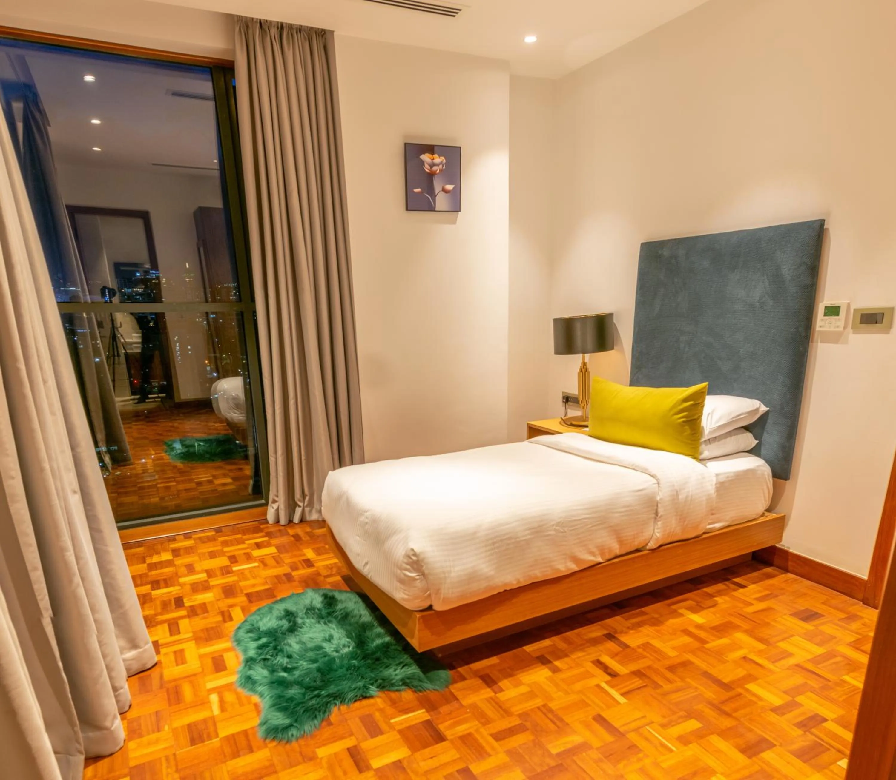 Bed in Broadwalk Residency