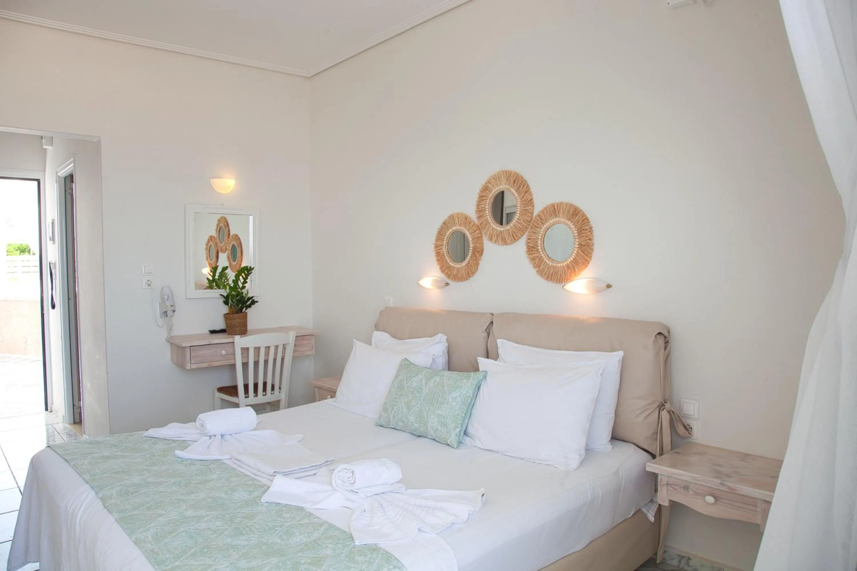 Photo of the whole room, Bed in The Milos