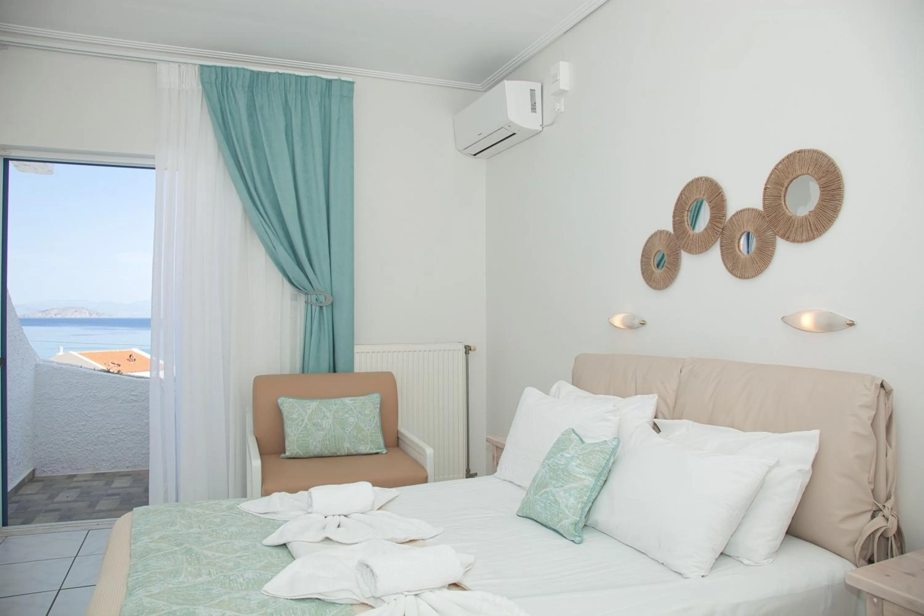 Photo of the whole room, Bed in The Milos