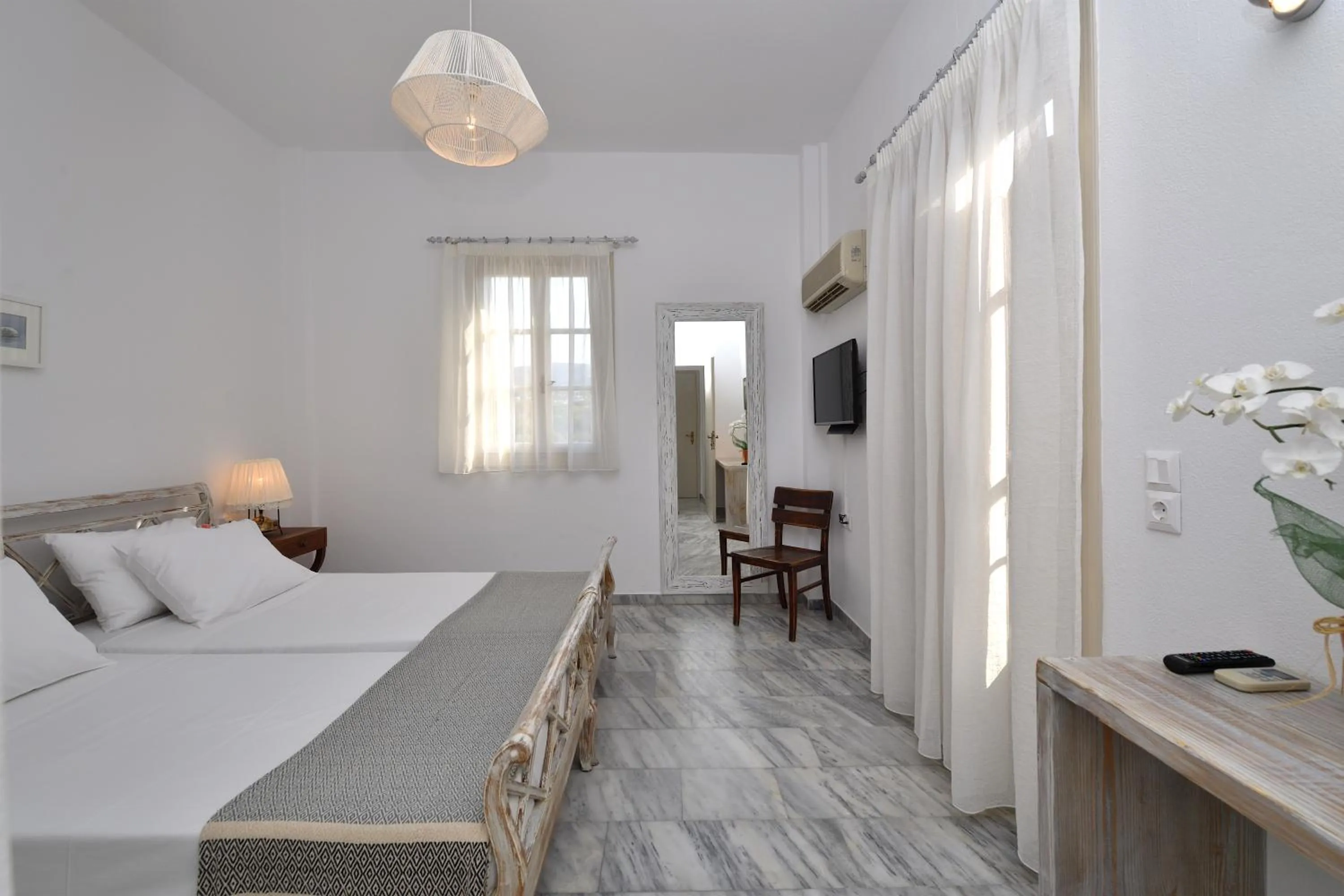 Bed in Hotel Swiss Home