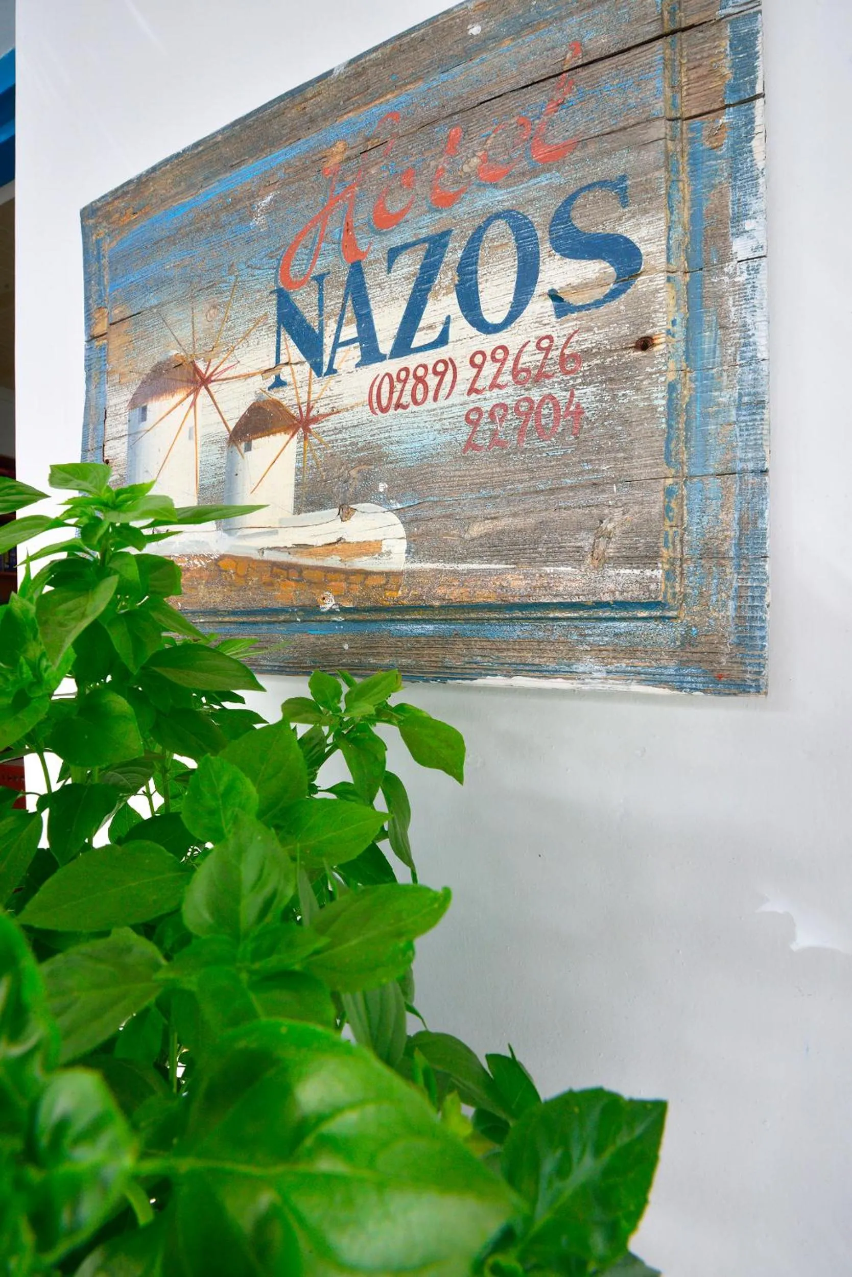 Property logo or sign in Hotel Nazos