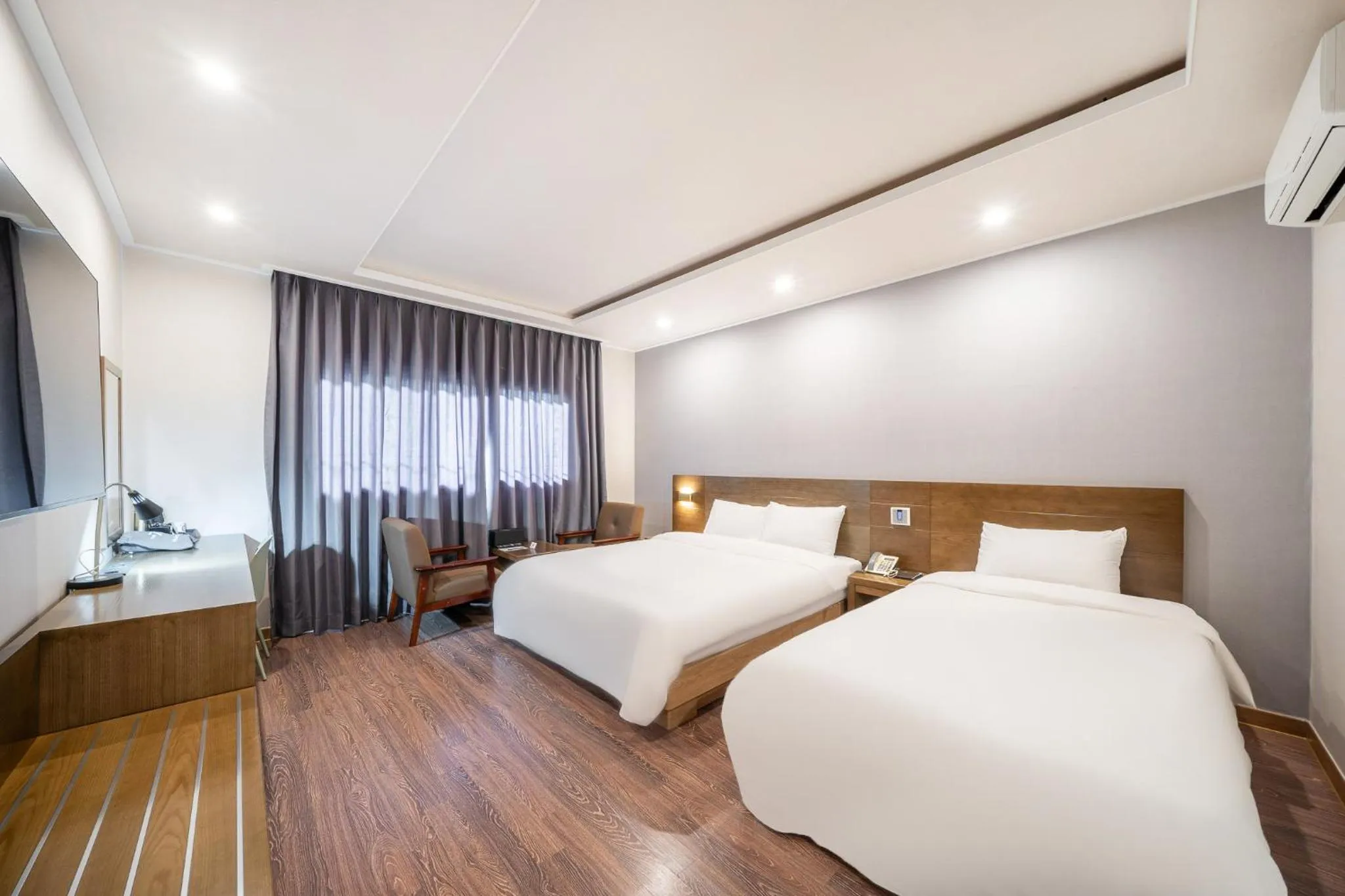 Bed in The 7 Business Hotel