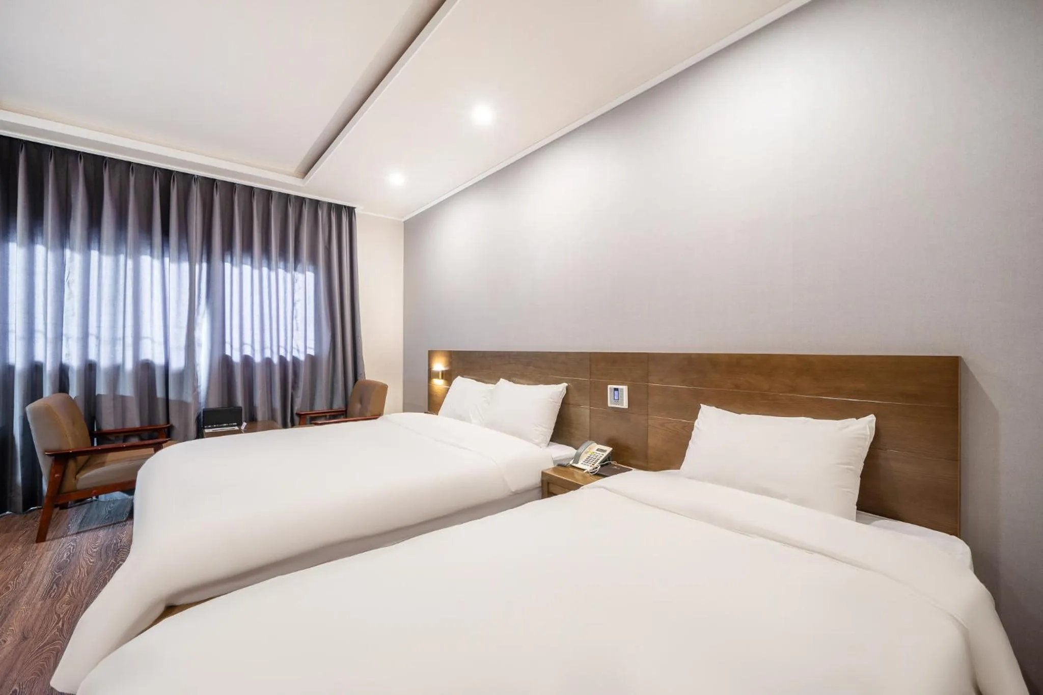 Bed in The 7 Business Hotel